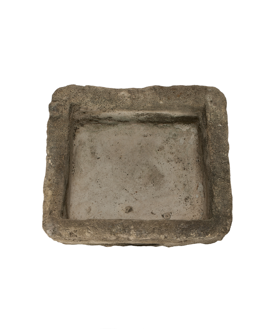 Vintage rectangular Indonesian limestone trough with visible textured interior and rustic patina from overhead.