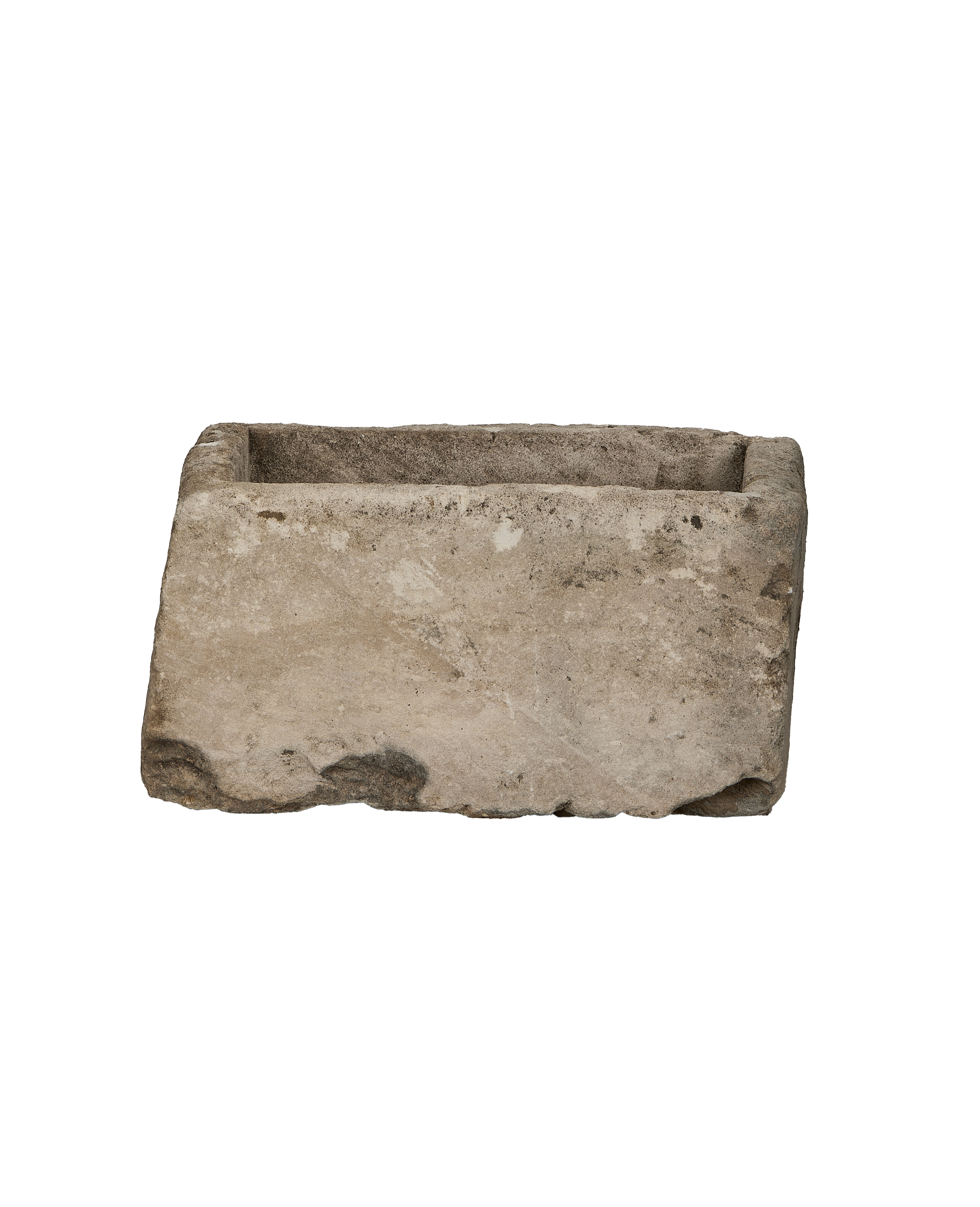 Vintage Indonesian rectangular limestone trough, detailed view of textured rough-hewn stone surface.