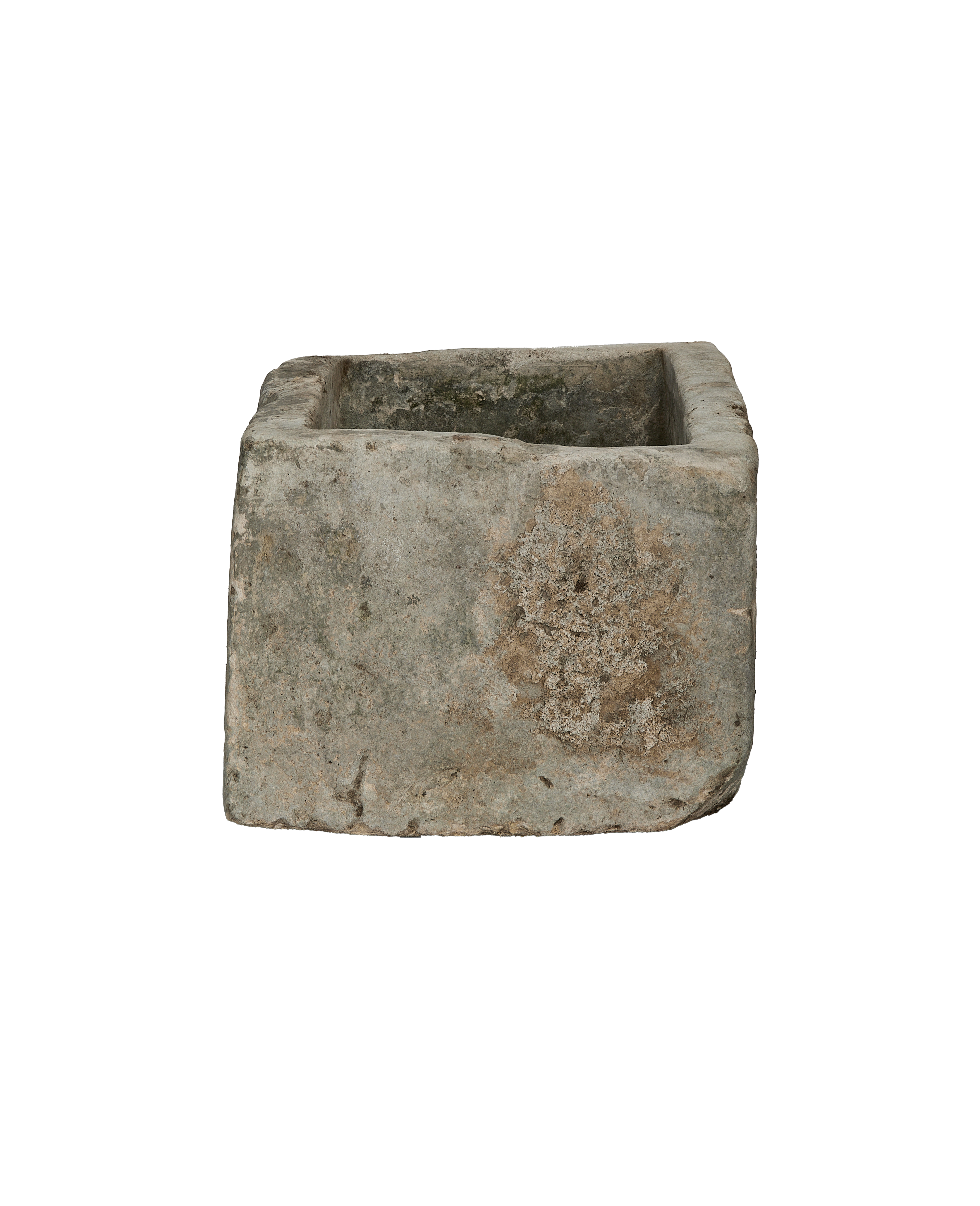 Vintage Indonesian limestone trough, showing weathered texture and interior of the rectangular basin.