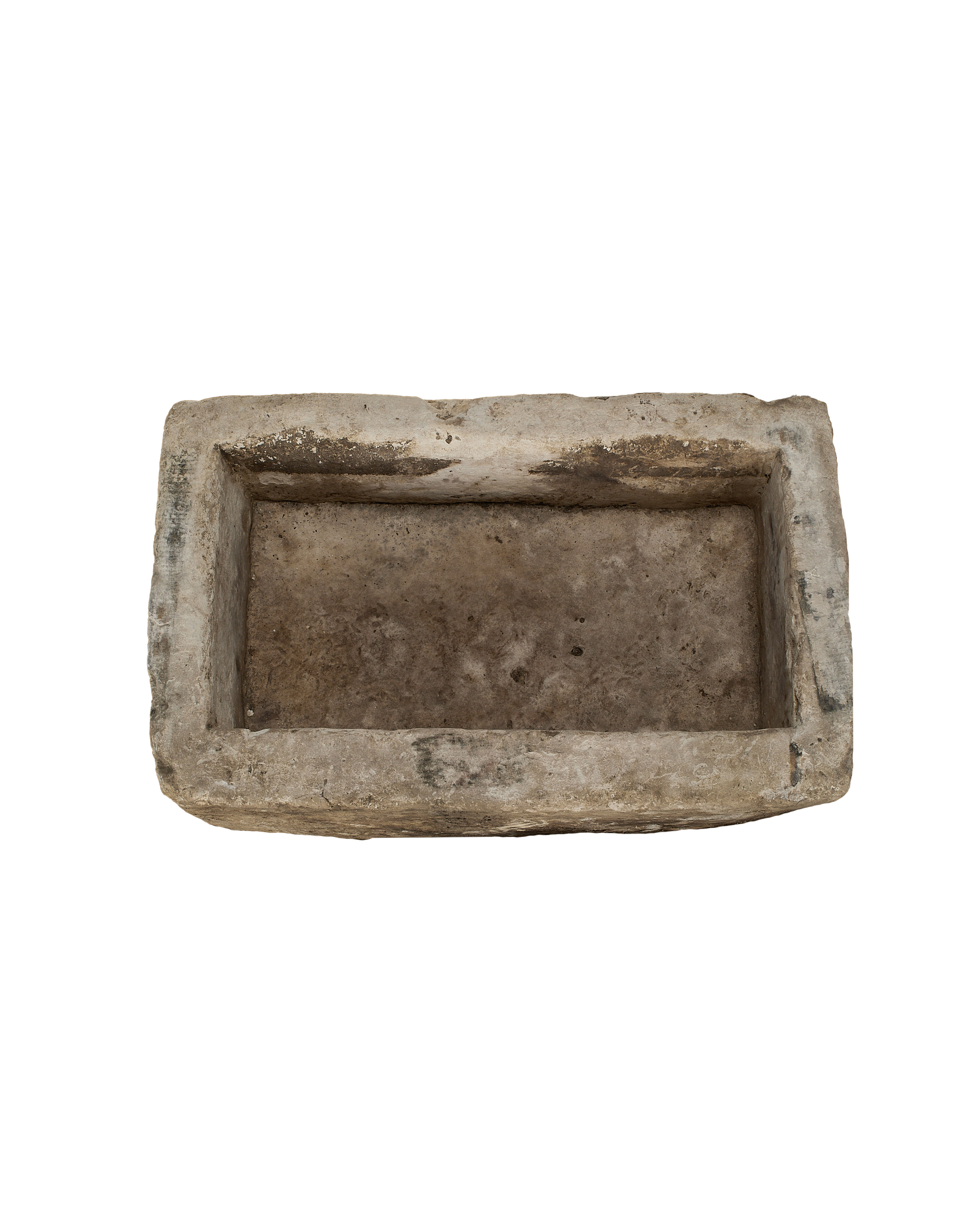 Vintage rectangular limestone trough, showing the weathered texture of its interior.