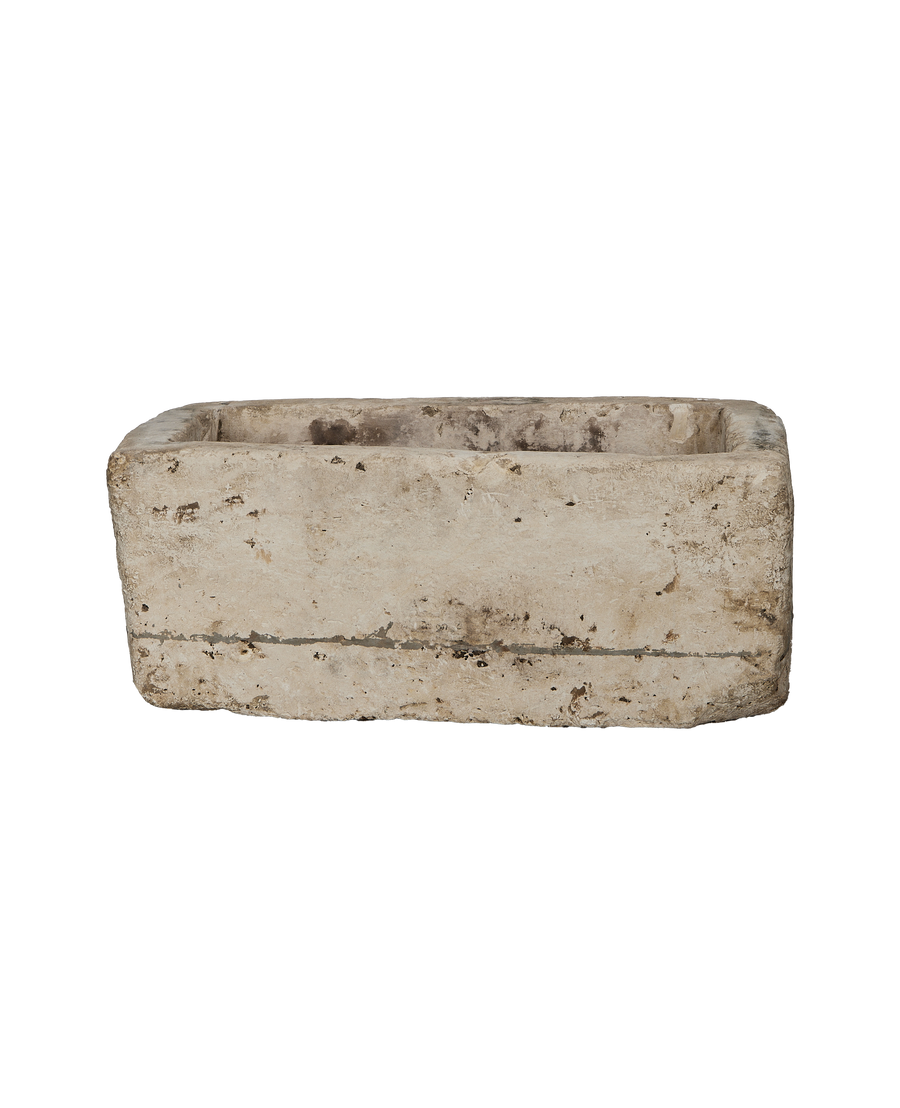 Vintage limestone trough, rectangular, from Indonesia, weathered light finish, top view showing interior.
