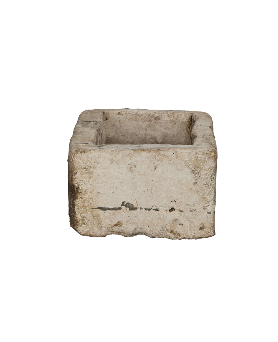 Vintage rectangular limestone trough, showing rugged natural texture and character from use.