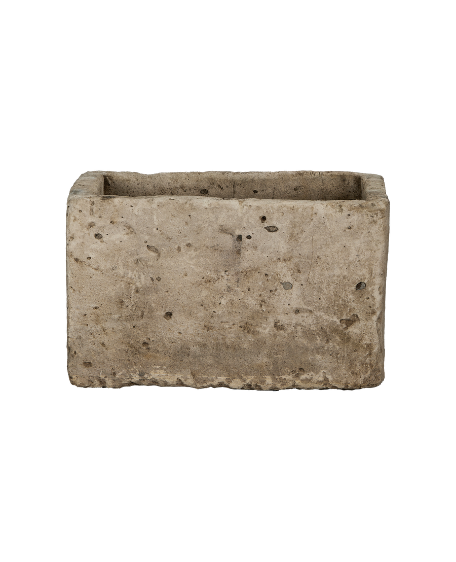 Vintage rectangular Indonesian limestone trough with rough, weathered texture and deep patina.