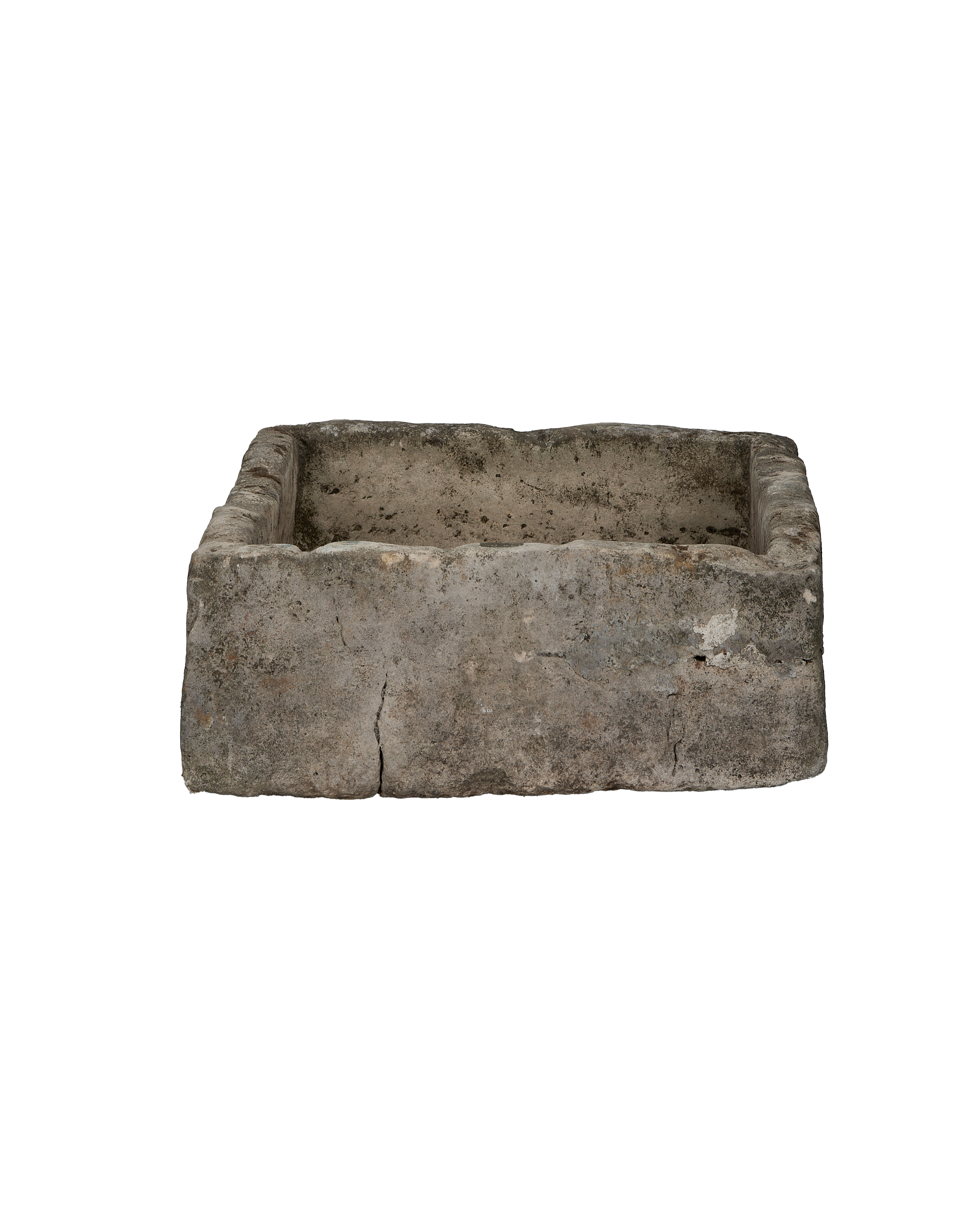 Vintage rectangular limestone trough, front view, showing weathered gray-brown patina and minor crack.