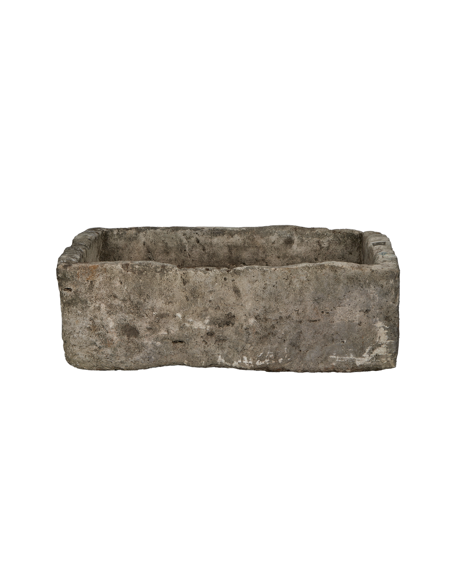 Vintage Indonesian limestone trough, rectangular, showcasing eroded, weathered texture from a top-down angle.