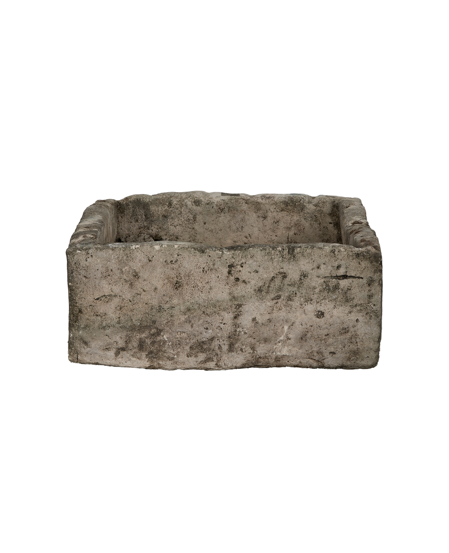 Vintage rectangular limestone trough, showing weathered texture and natural imperfections from Indonesia.