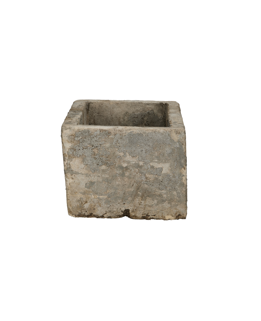 Vintage Indonesian limestone trough, rectangular, with distressed aged texture, side view.