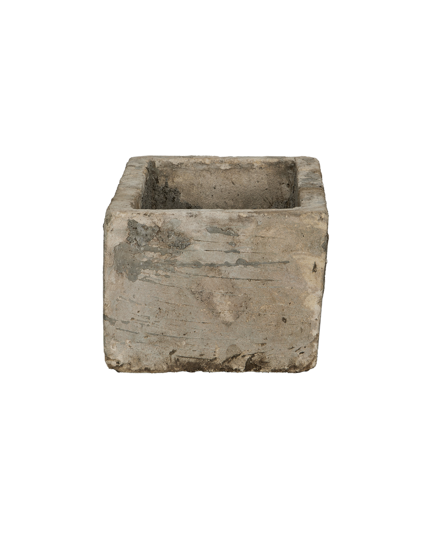 Vintage Indonesian limestone trough, top view showing weathered rectangular basin and rough texture.