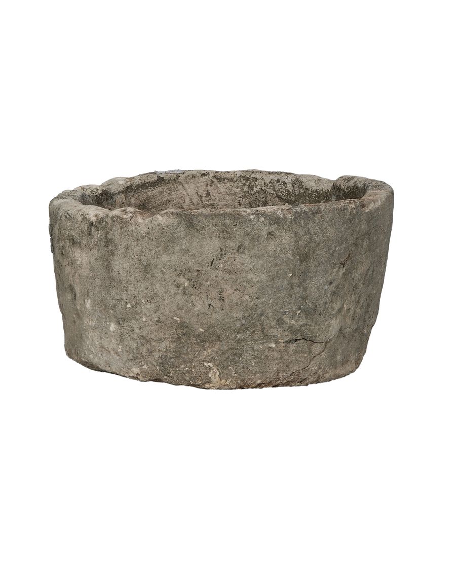 Vintage round limestone trough, aged grey patina, rough texture, Indonesian origin.
