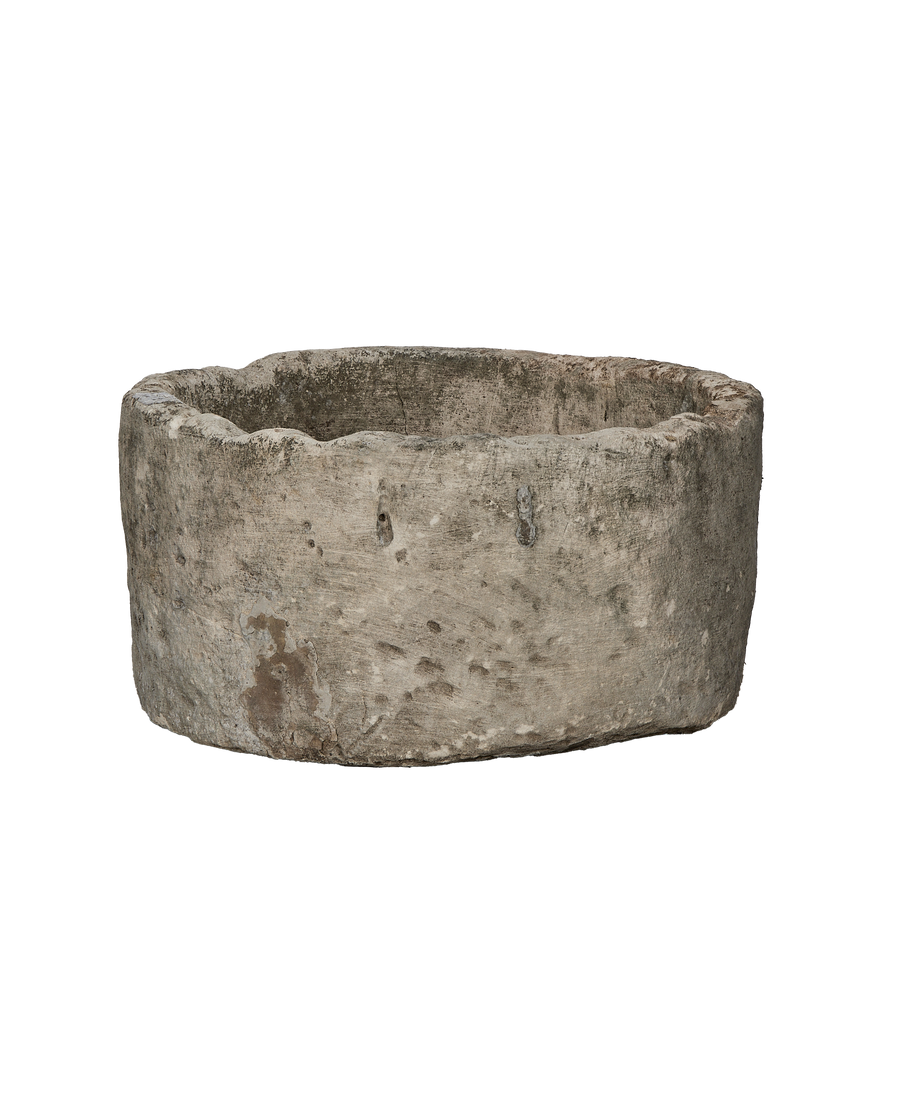 Vintage round limestone trough (Indonesia), showing rugged, weathered texture and aged patination.