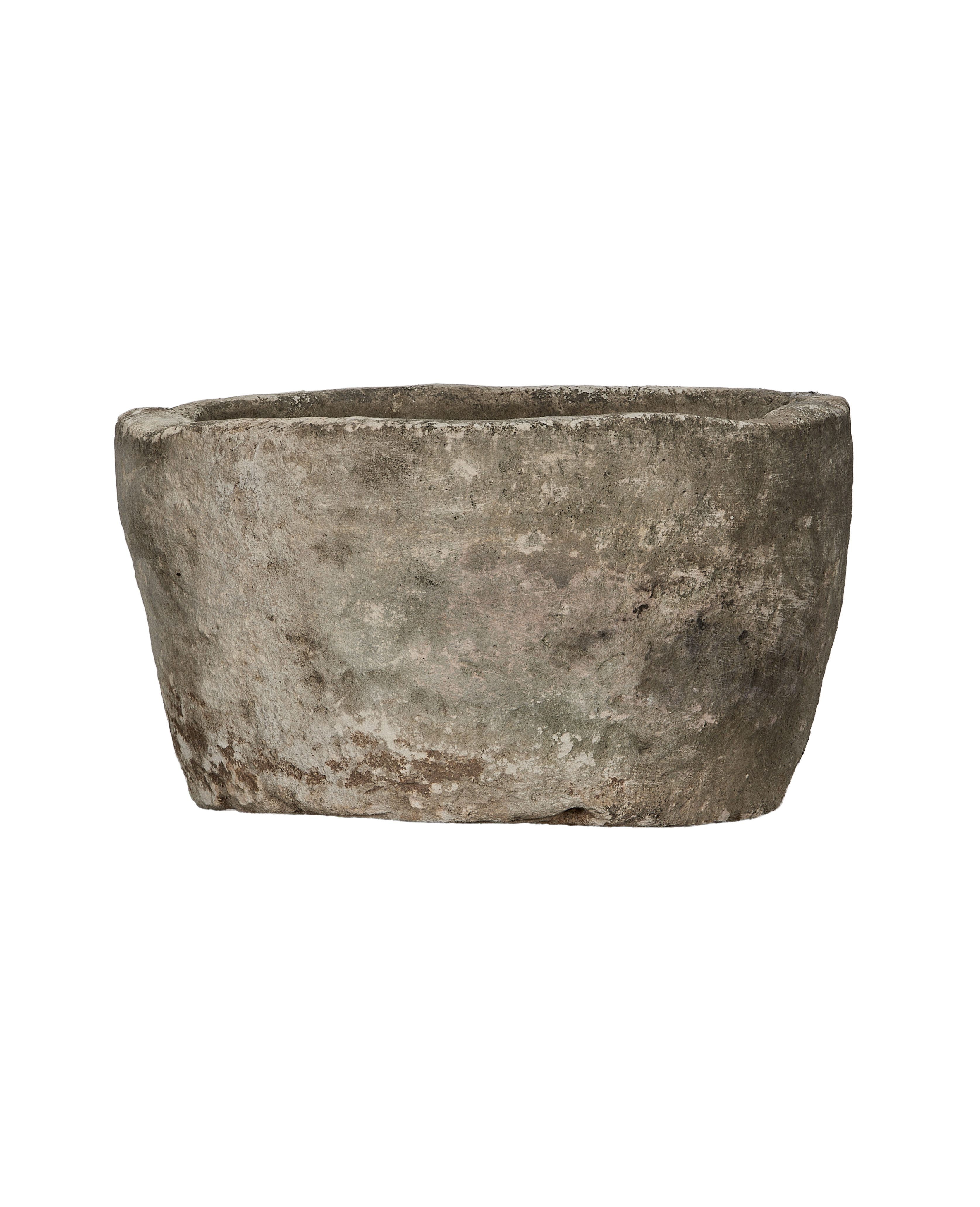 Vintage round limestone trough, side profile, rough weathered texture, unique Indonesian garden decor.