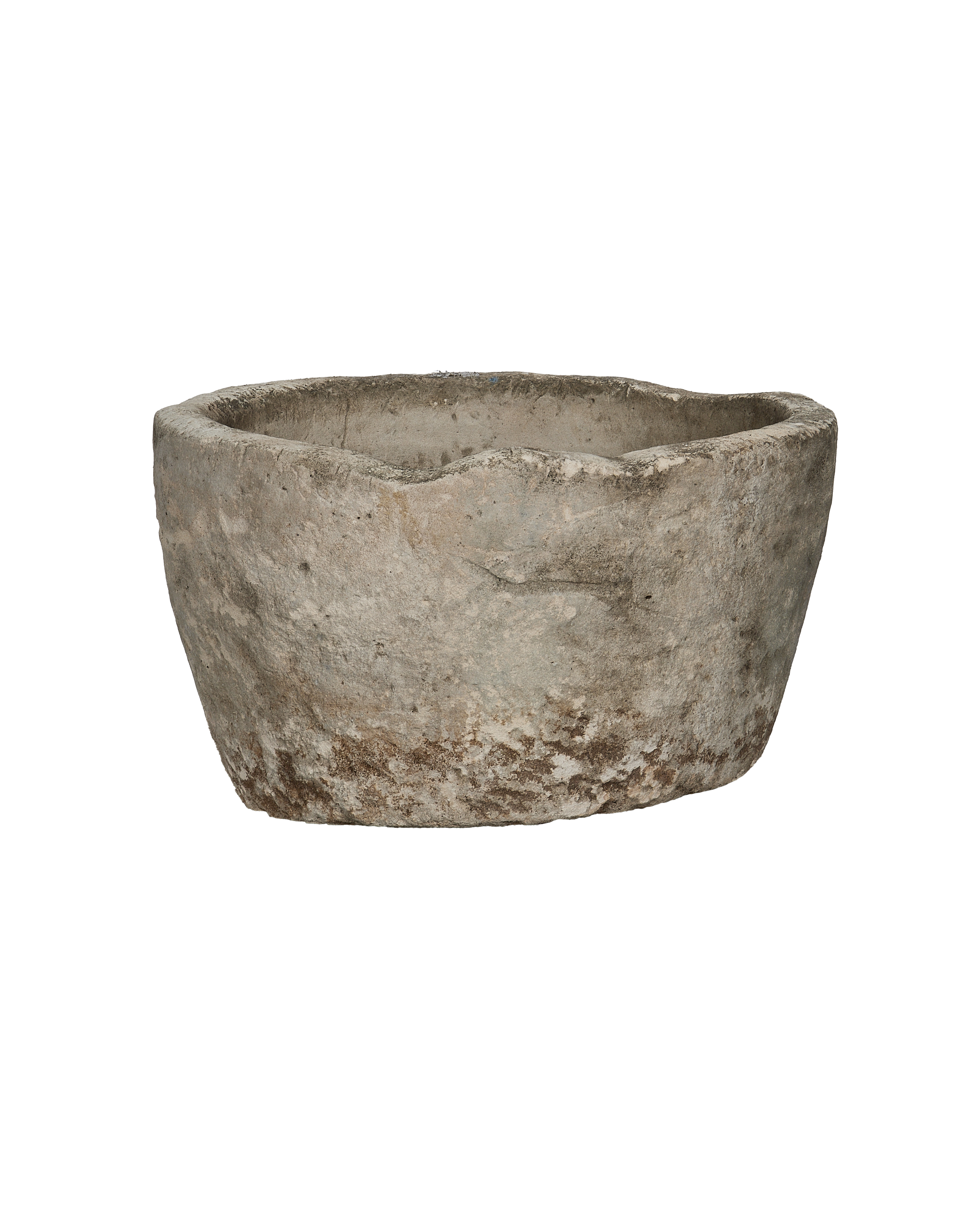 Vintage Indonesian limestone trough closeup, showcasing rough texture and weathered finish.