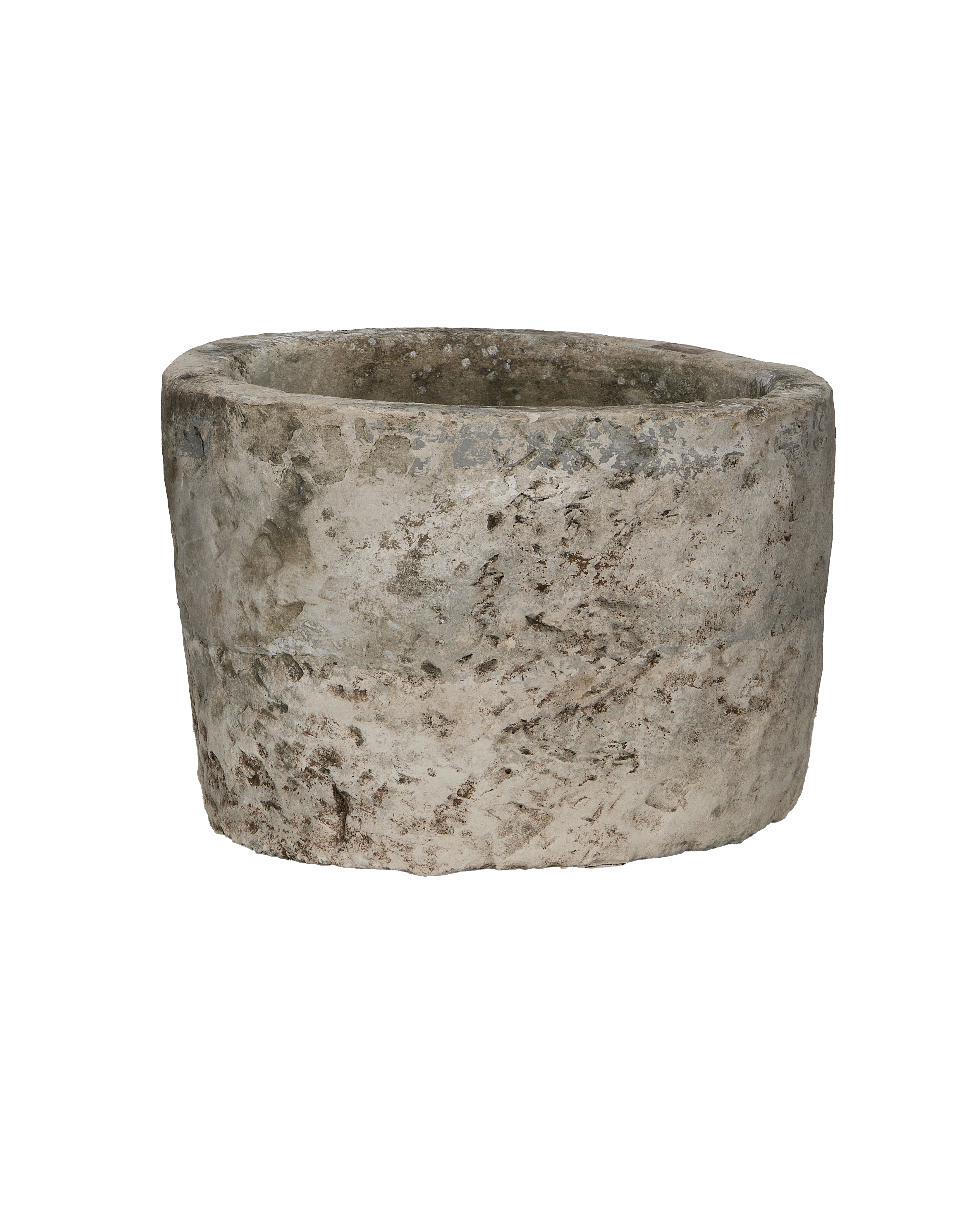 Vintage round Indonesian limestone trough, grey, with textured, weathered surface, and rough edges.
