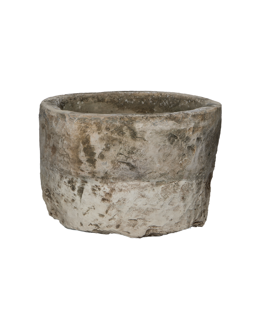 Vintage Indonesian round limestone trough, showcasing weathered texture and natural imperfections from an elevated view.