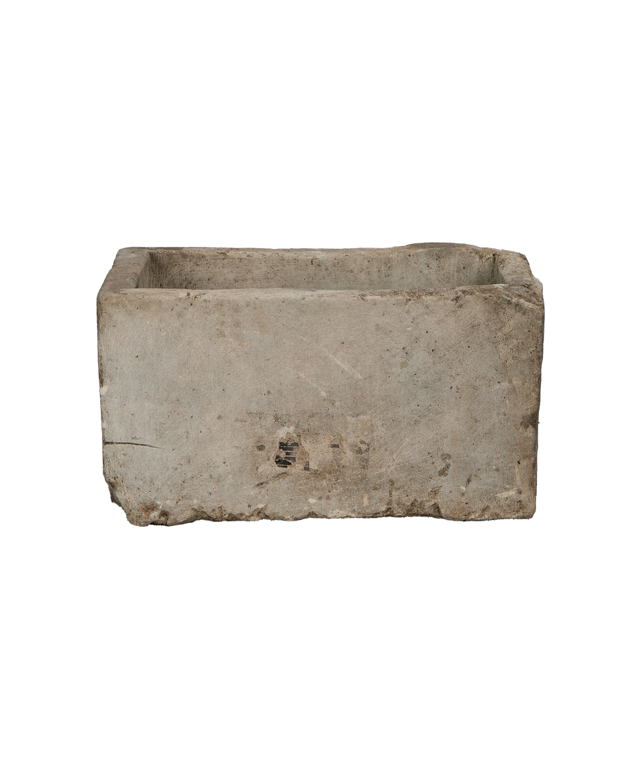 Vintage rectangular limestone trough, showing textured side with natural imperfections from Indonesia.