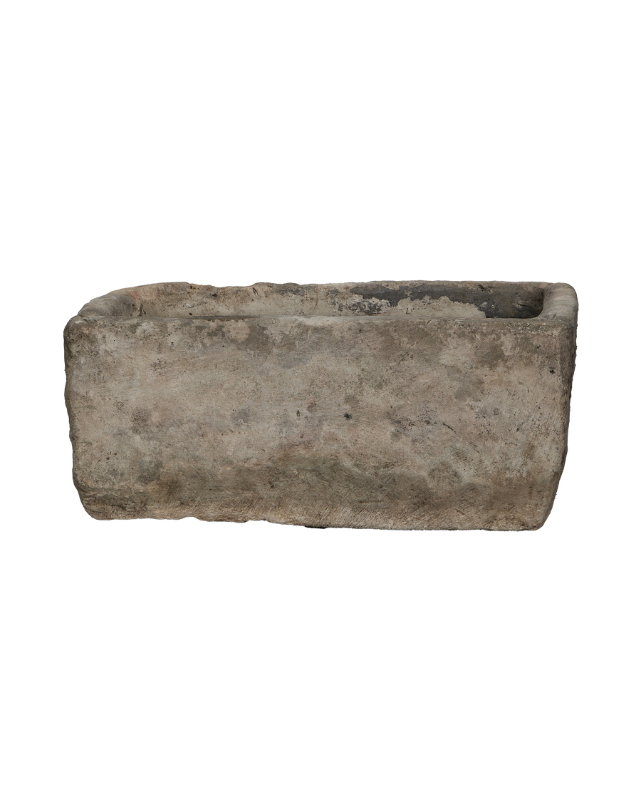 Vintage Indonesian rectangular limestone trough, full-length, showing aged texture, rough edges, and weathered interior.