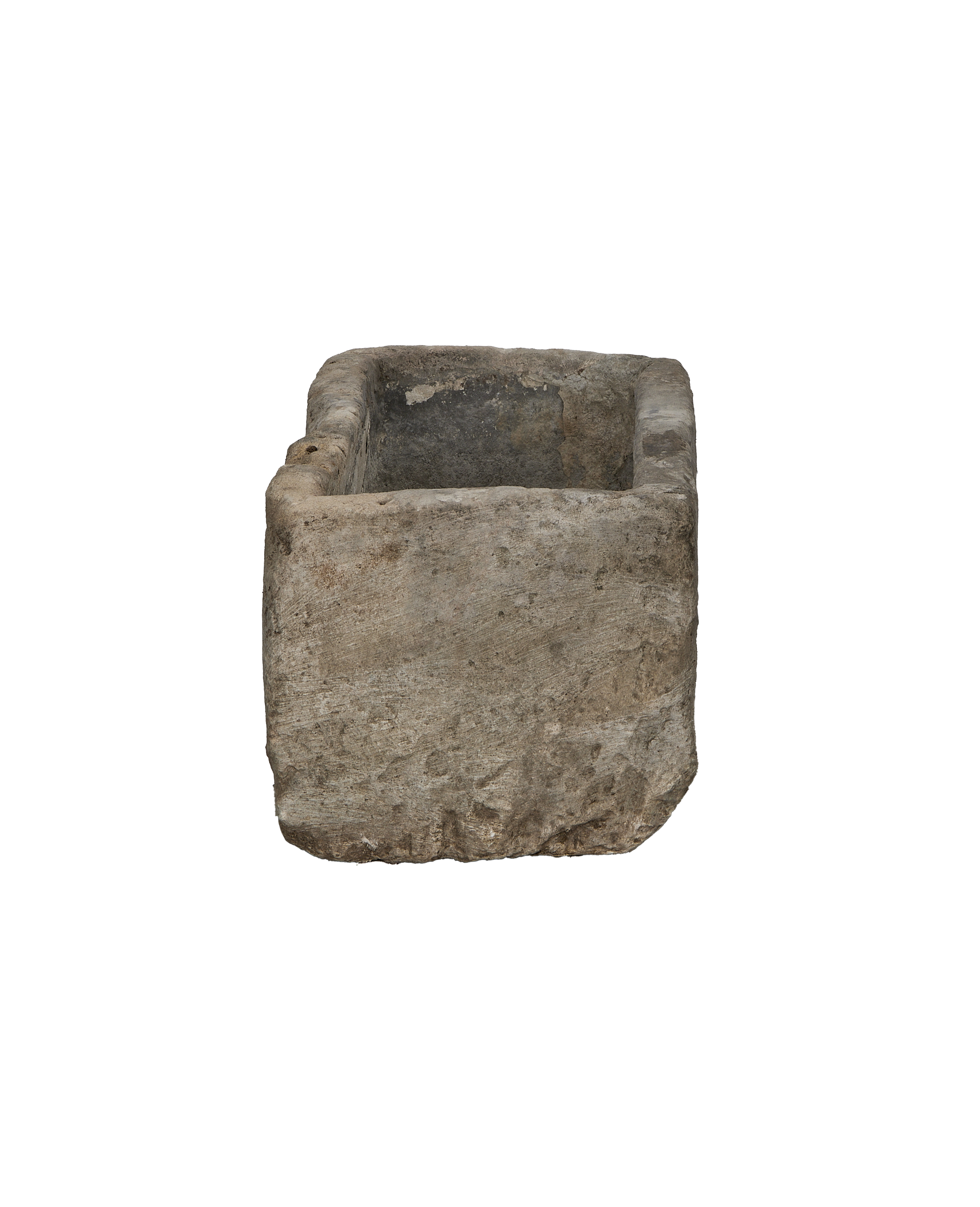 Vintage Indonesian limestone trough, showing weathered texture from an elevated angle.
