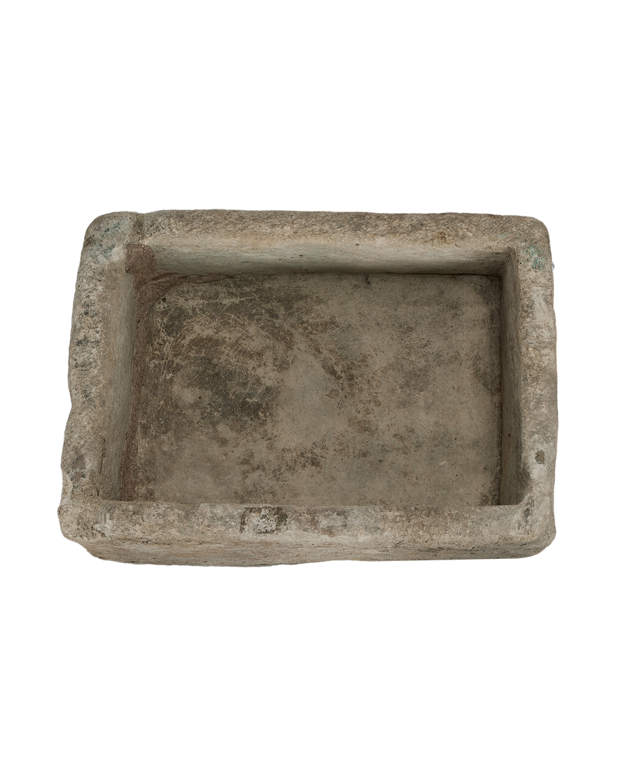 Vintage Indonesian limestone trough (OAK Rectangle) from top-down, showing interior texture.