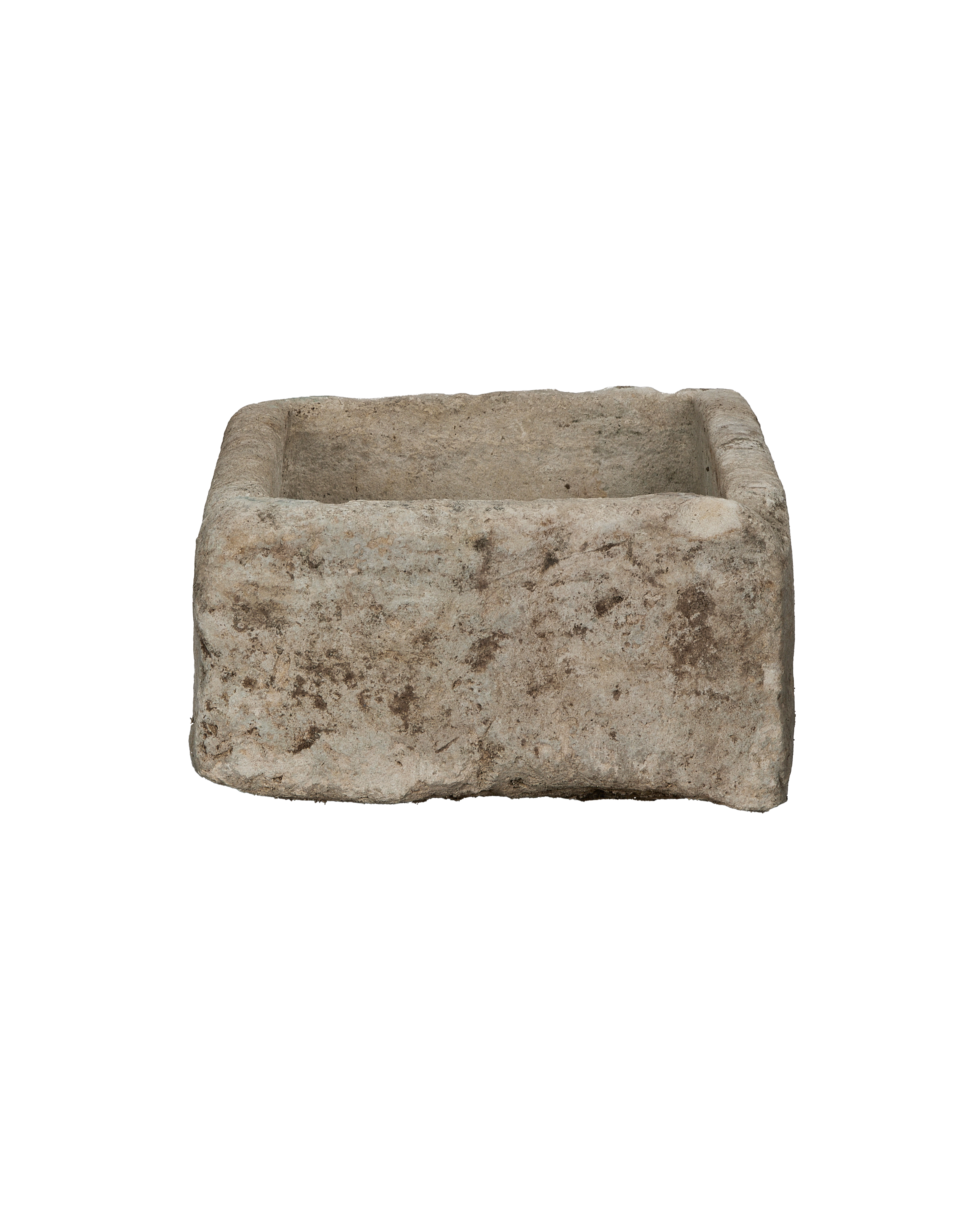 Vintage rectangular limestone trough, showing the rough, weathered texture and earthy patina.