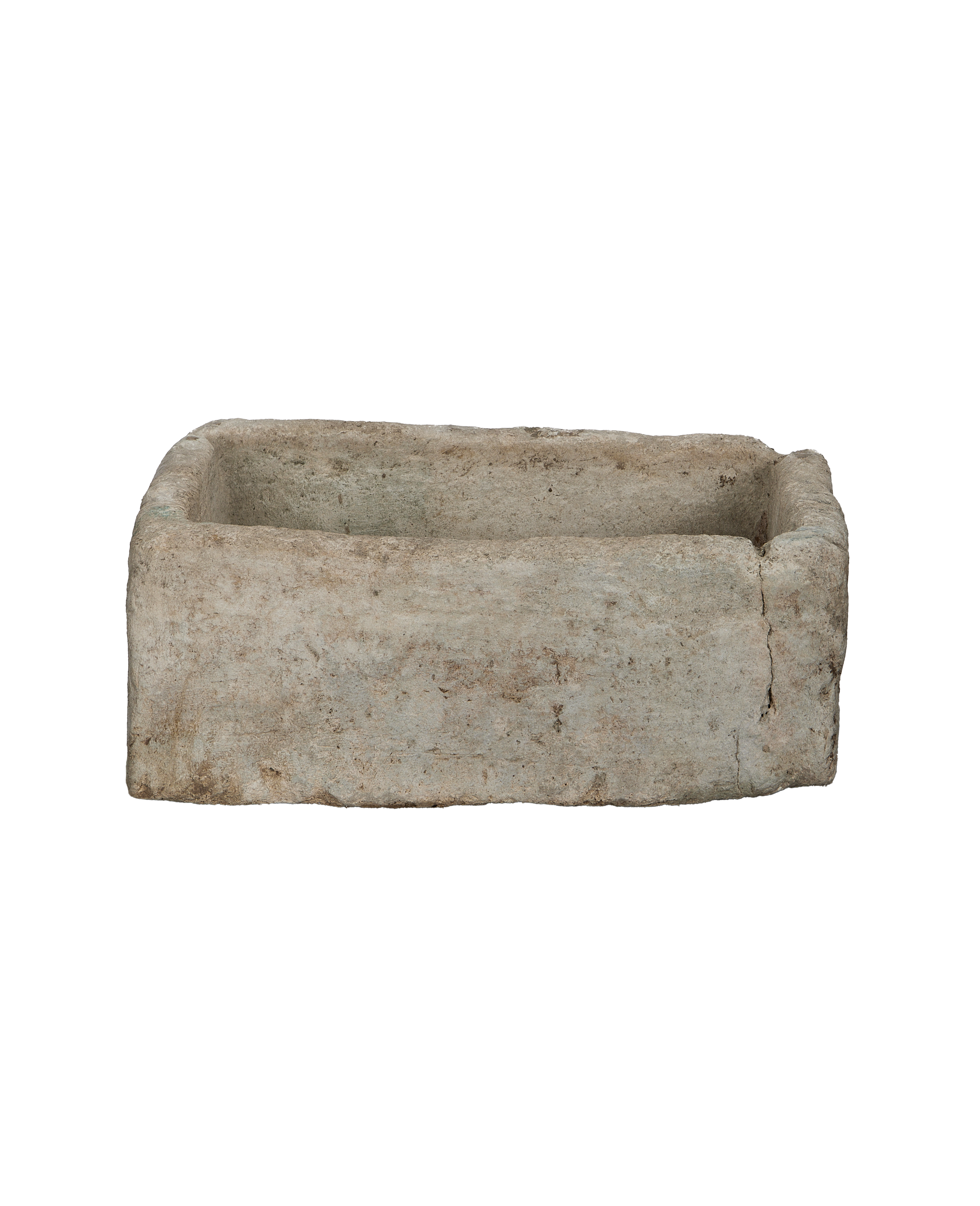 Vintage Indonesian rectangular limestone trough showing full front and right side.