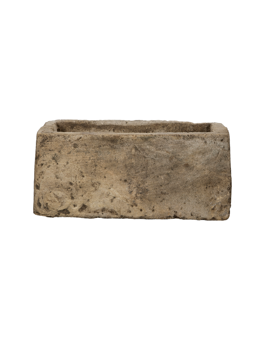 Vintage Indonesian rectangular limestone trough showing weathered texture and natural imperfections.