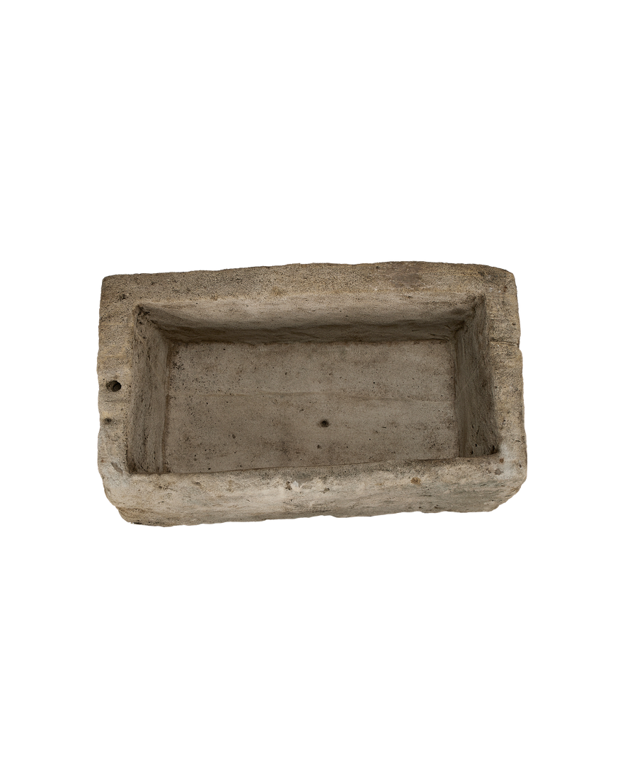 Vintage limestone trough from Indonesia, top view showing one drainage hole.