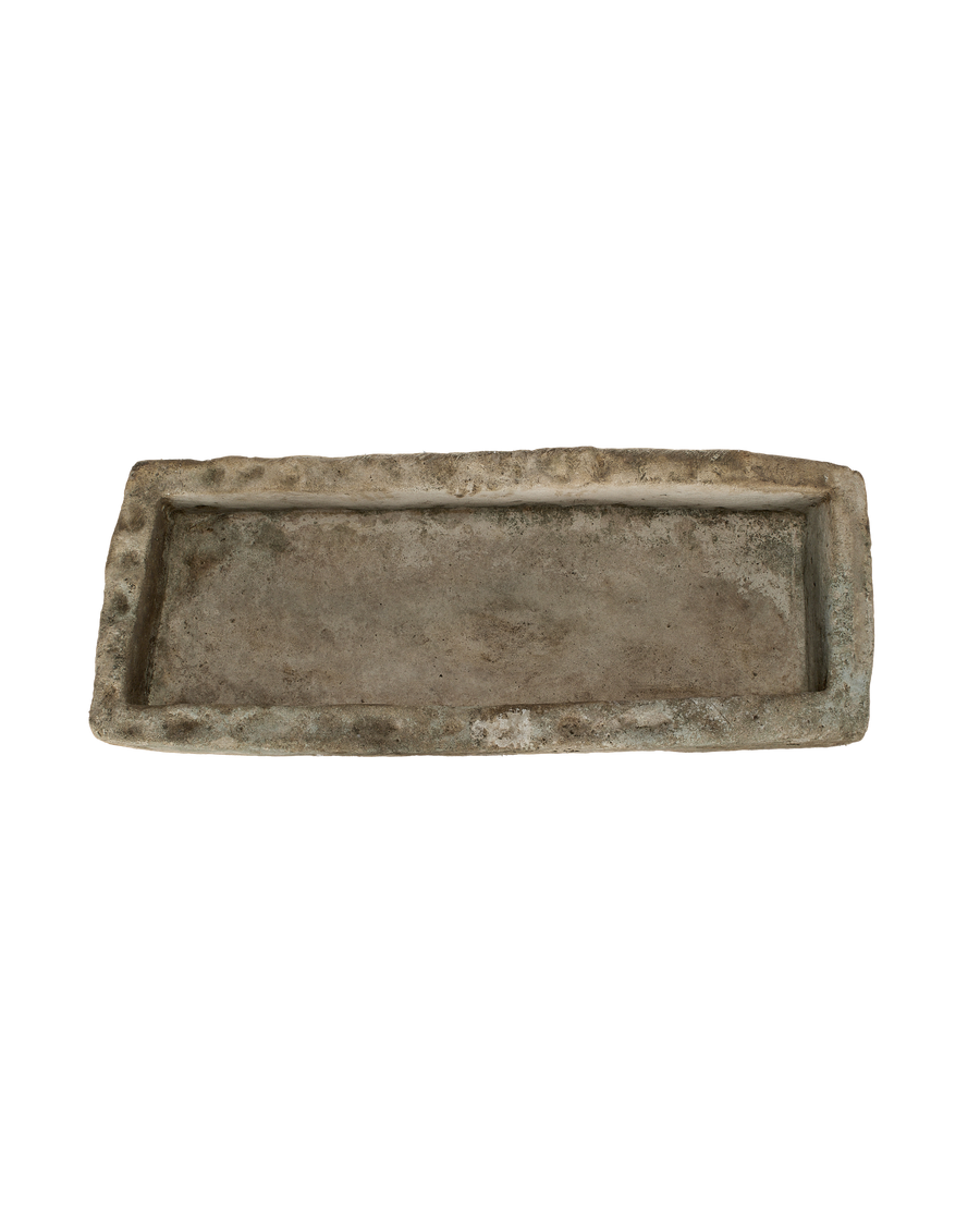 Vintage rectangular limestone trough, showing the weathered texture and aged patina on its inner surface.