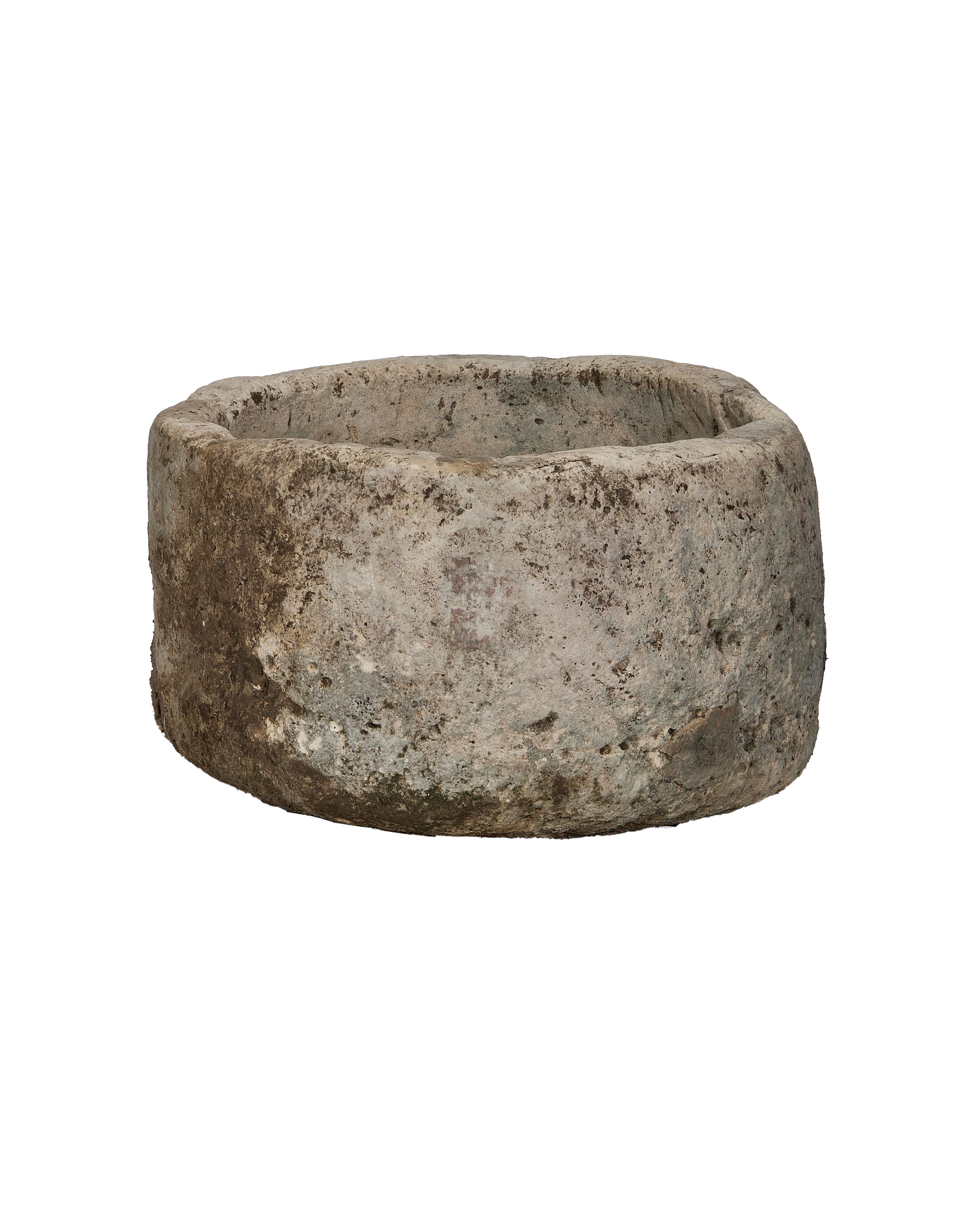 Round Indonesian vintage limestone trough, mottled rustic surface, rough texture.