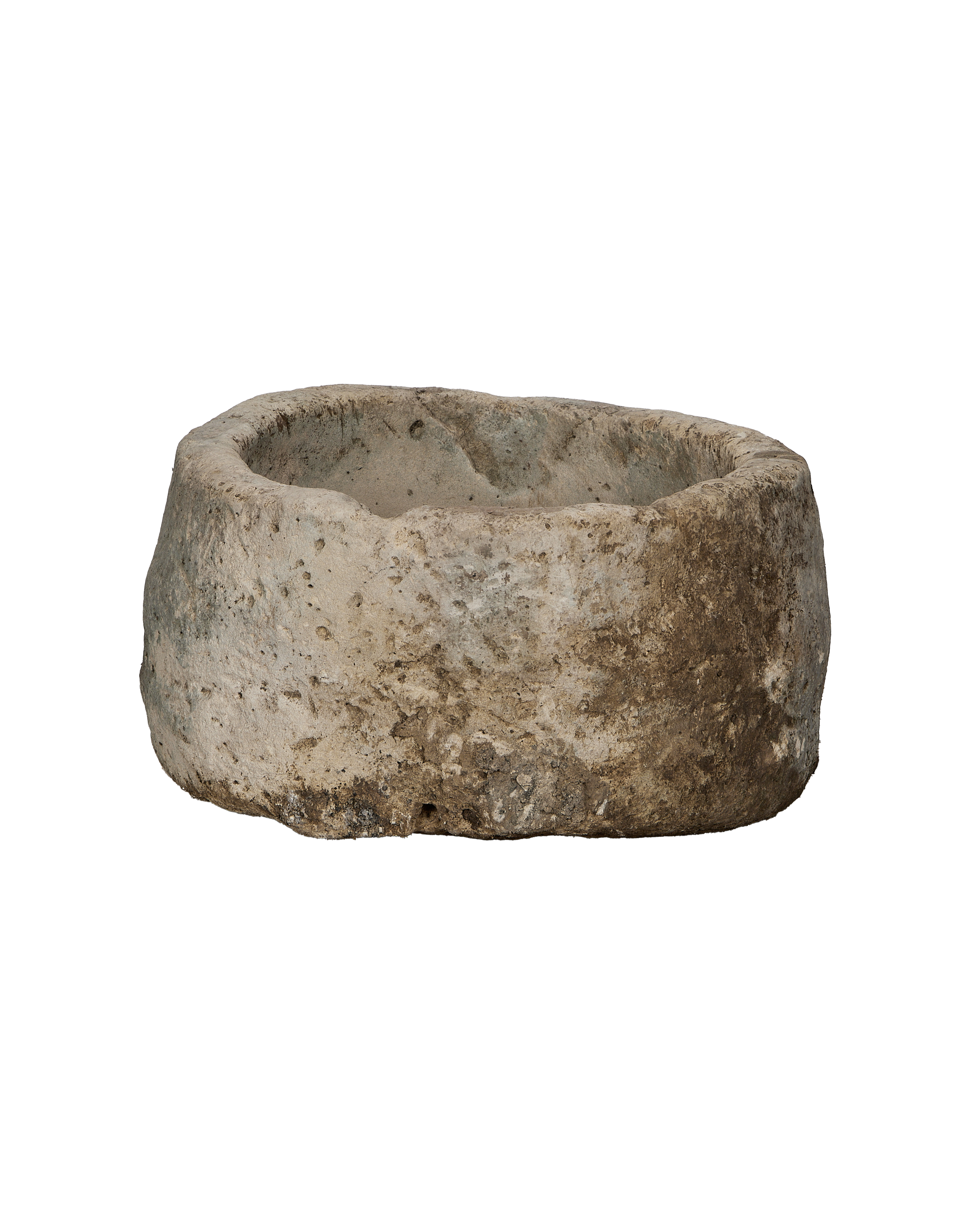 Vintage Indonesian limestone trough, round, showing earthy texture and natural imperfections.