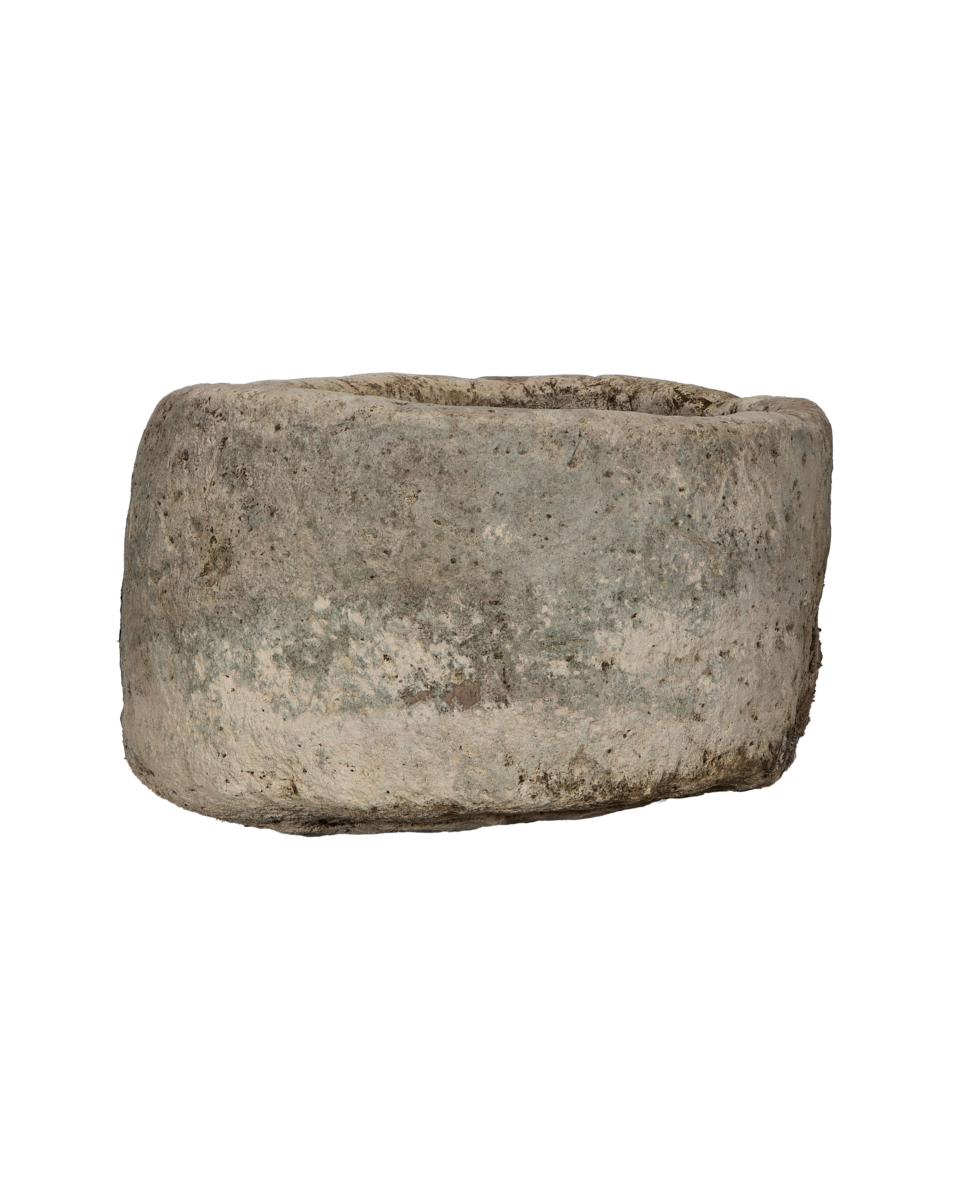 Vintage round Indonesian limestone trough, showing weathered texture, light erosion, and mossy green patination.