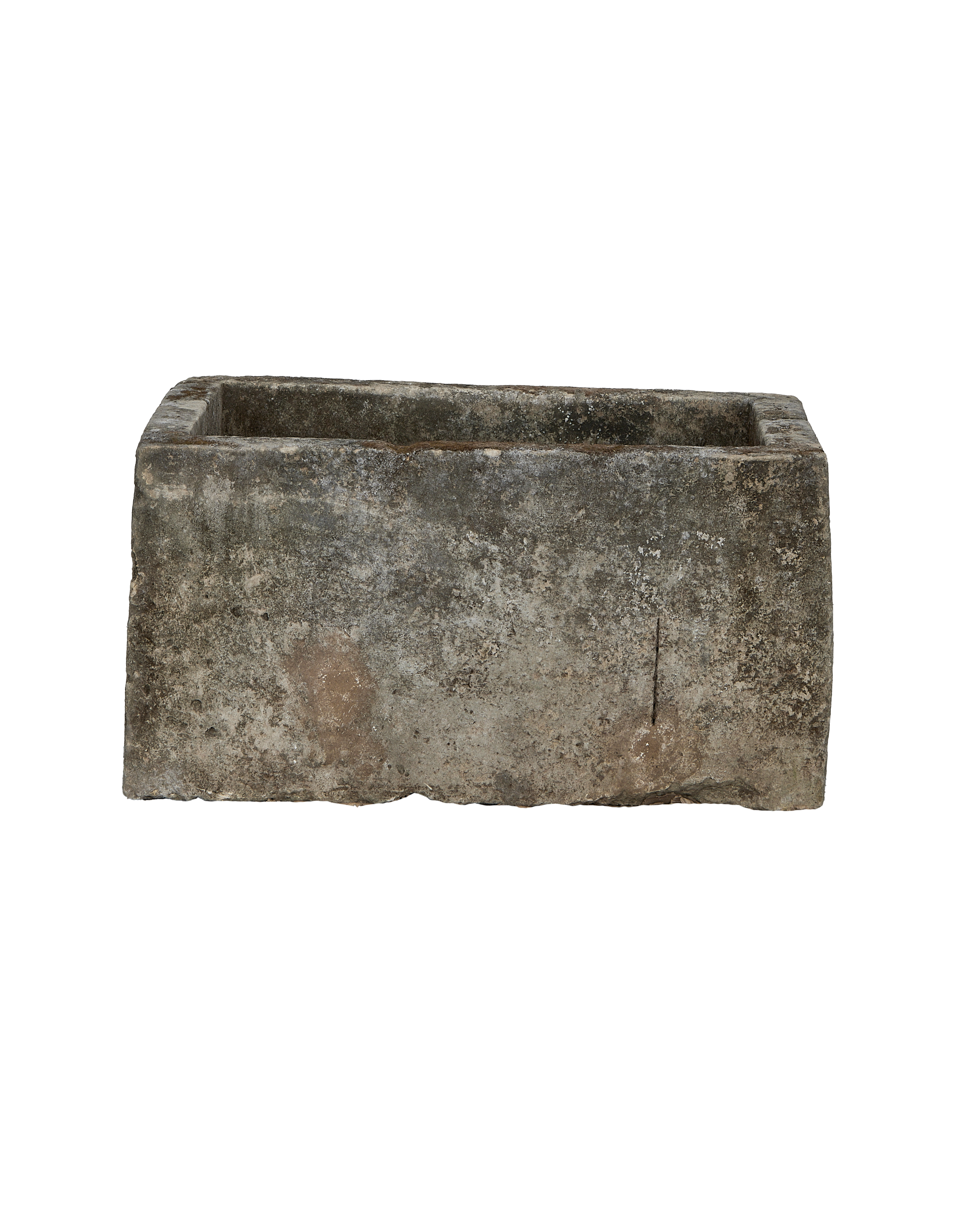 Vintage Indonesian rectangular limestone trough, showing weathered texture and natural imperfections, on black background.