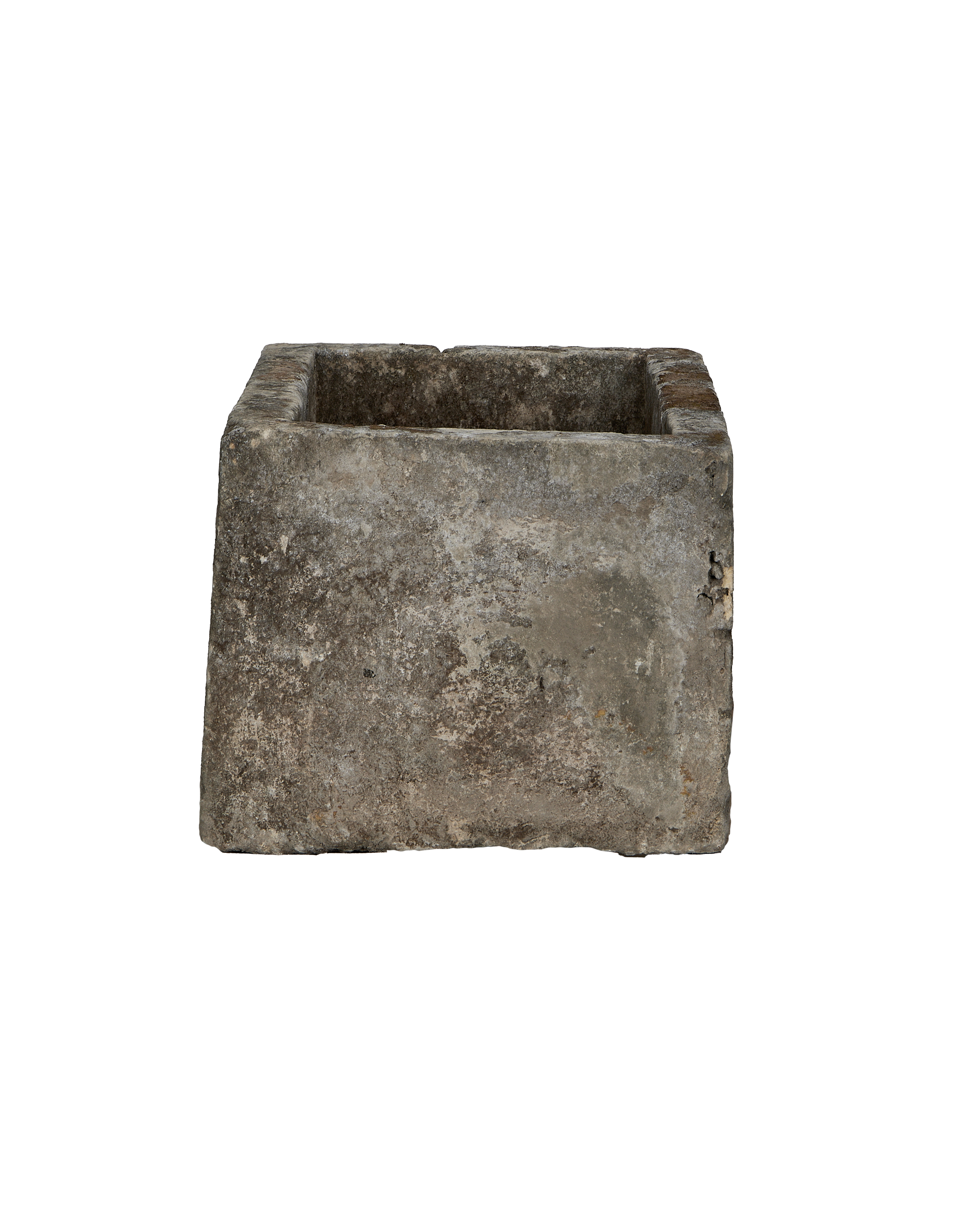 Vintage rectangular Indonesian limestone trough with weathered texture from a unique, low-angle view.