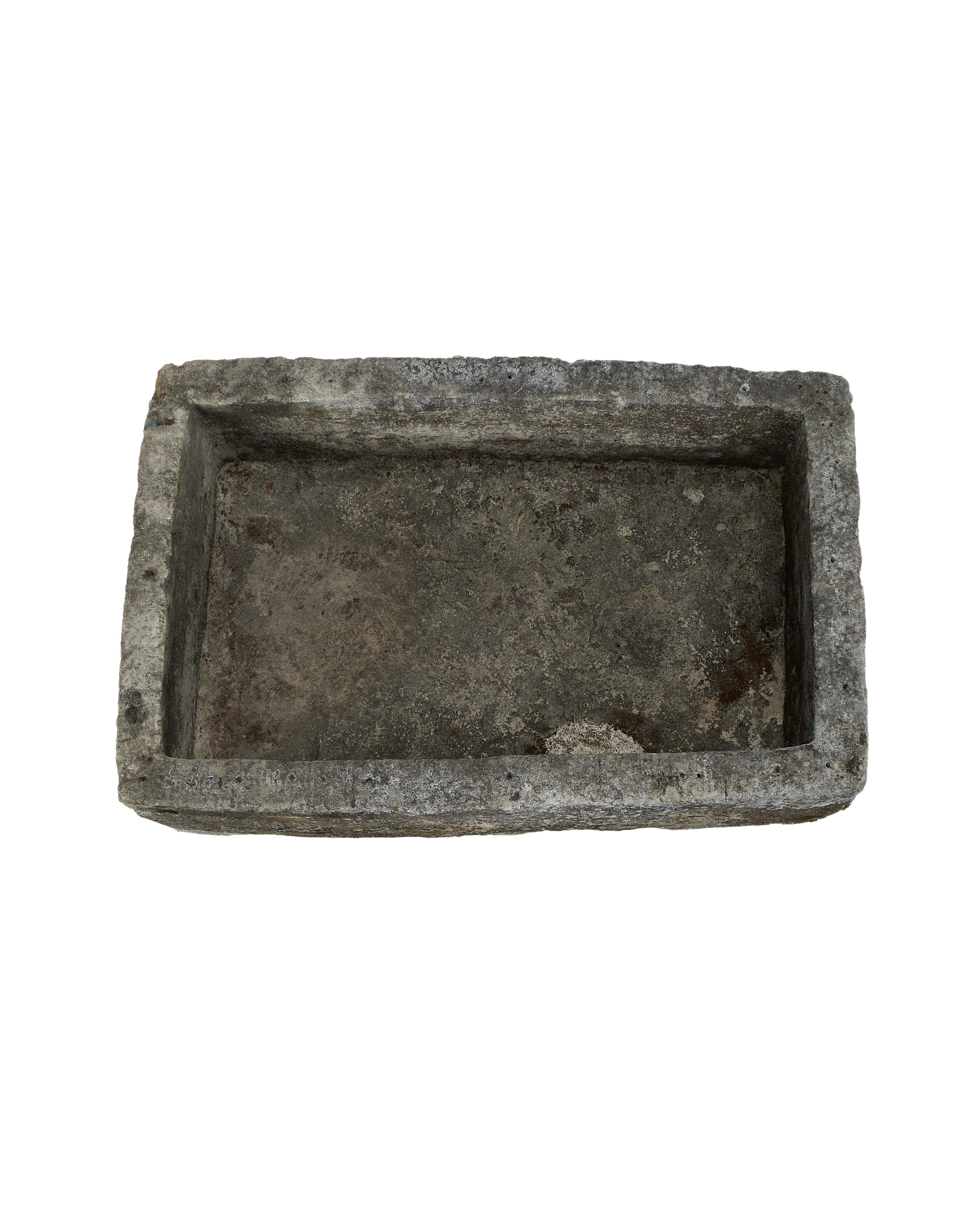 Vintage Indonesian rectangular limestone trough, top-down view showing interior and rough texture.