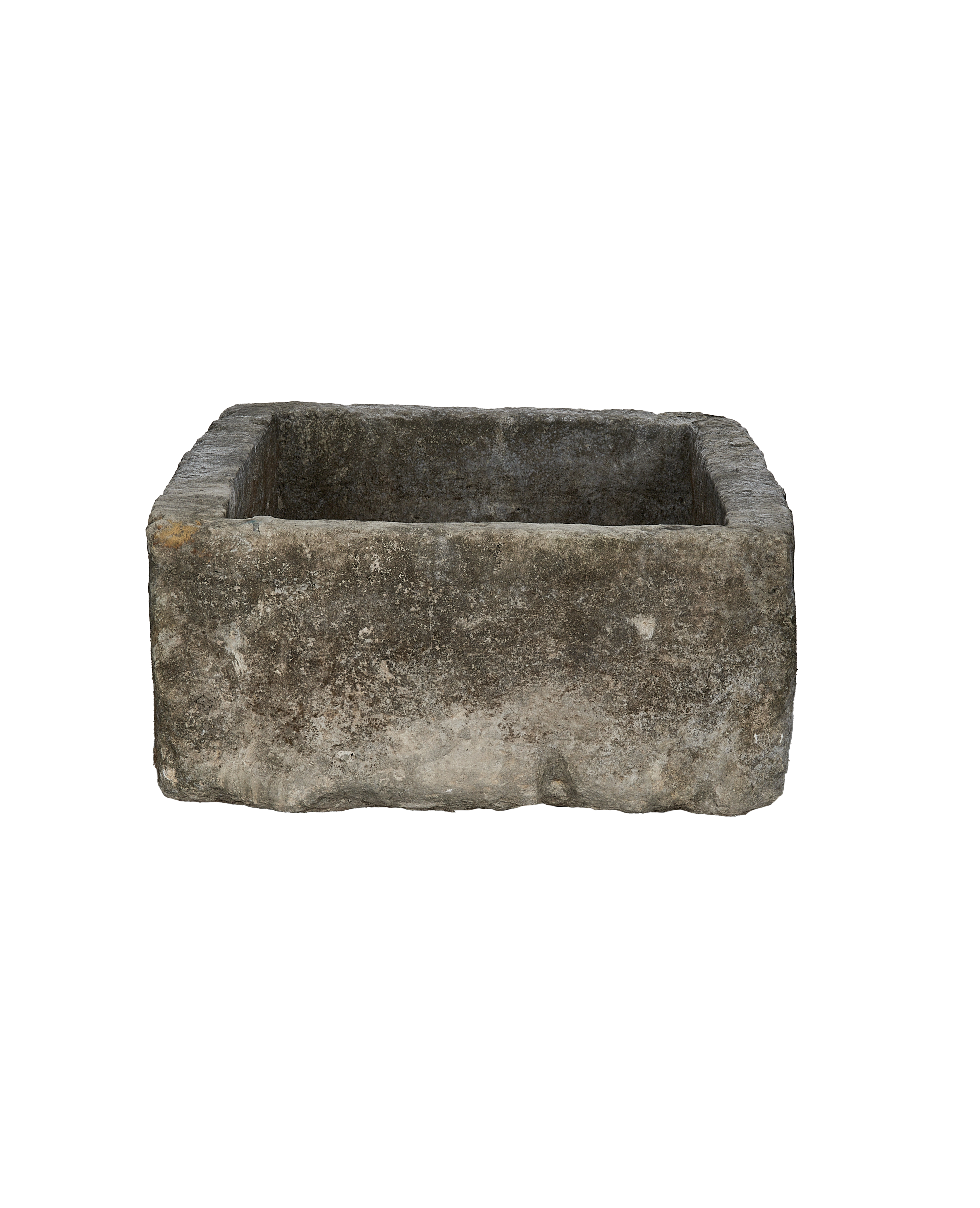 Vintage Indonesian limestone trough viewed from above, highlighting rustic gray texture and rectangular shape.