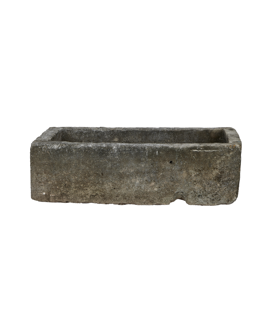 Vintage rectangular gray limestone trough from Indonesia, weathered surface and subtle details.