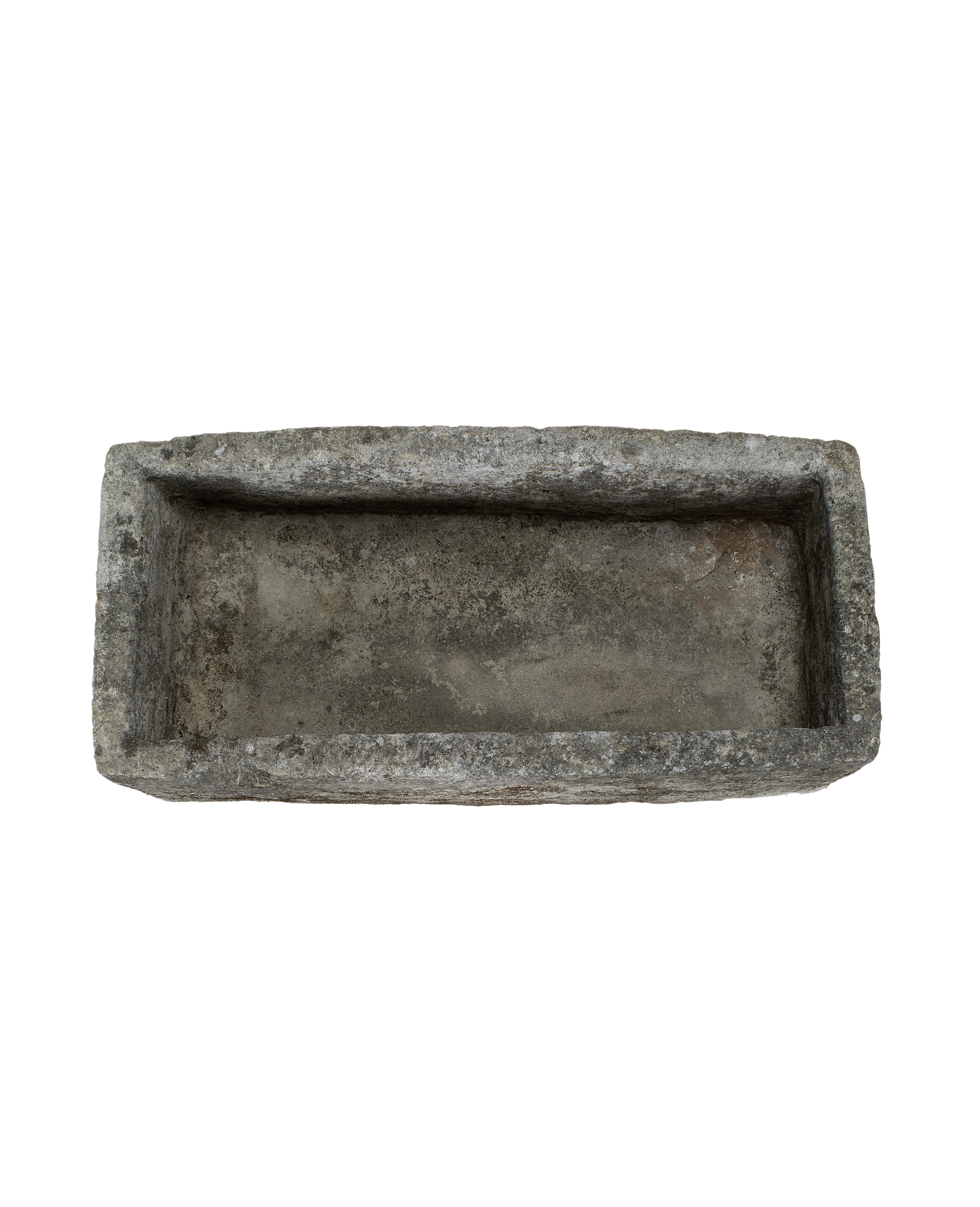 Vintage Indonesian limestone trough, top view, showing weathered, textured interior.