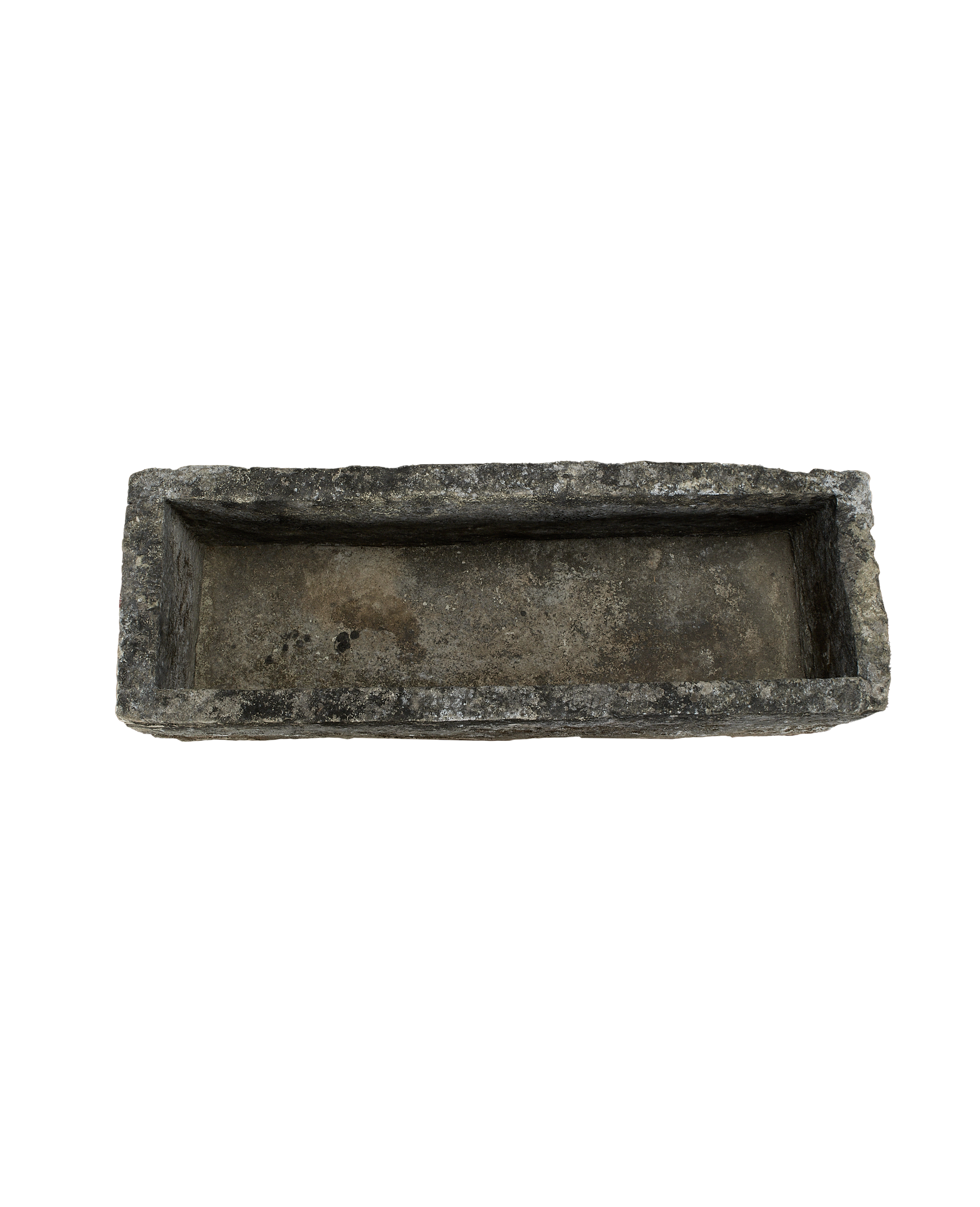 Vintage rectangular Indonesian limestone trough with rough-hewn texture, dark aged patina.