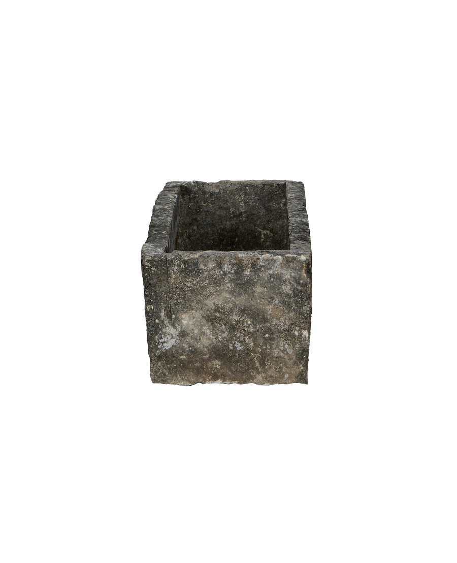 Vintage Indonesian limestone trough, rectangular, top-down internal view showing rough texture.