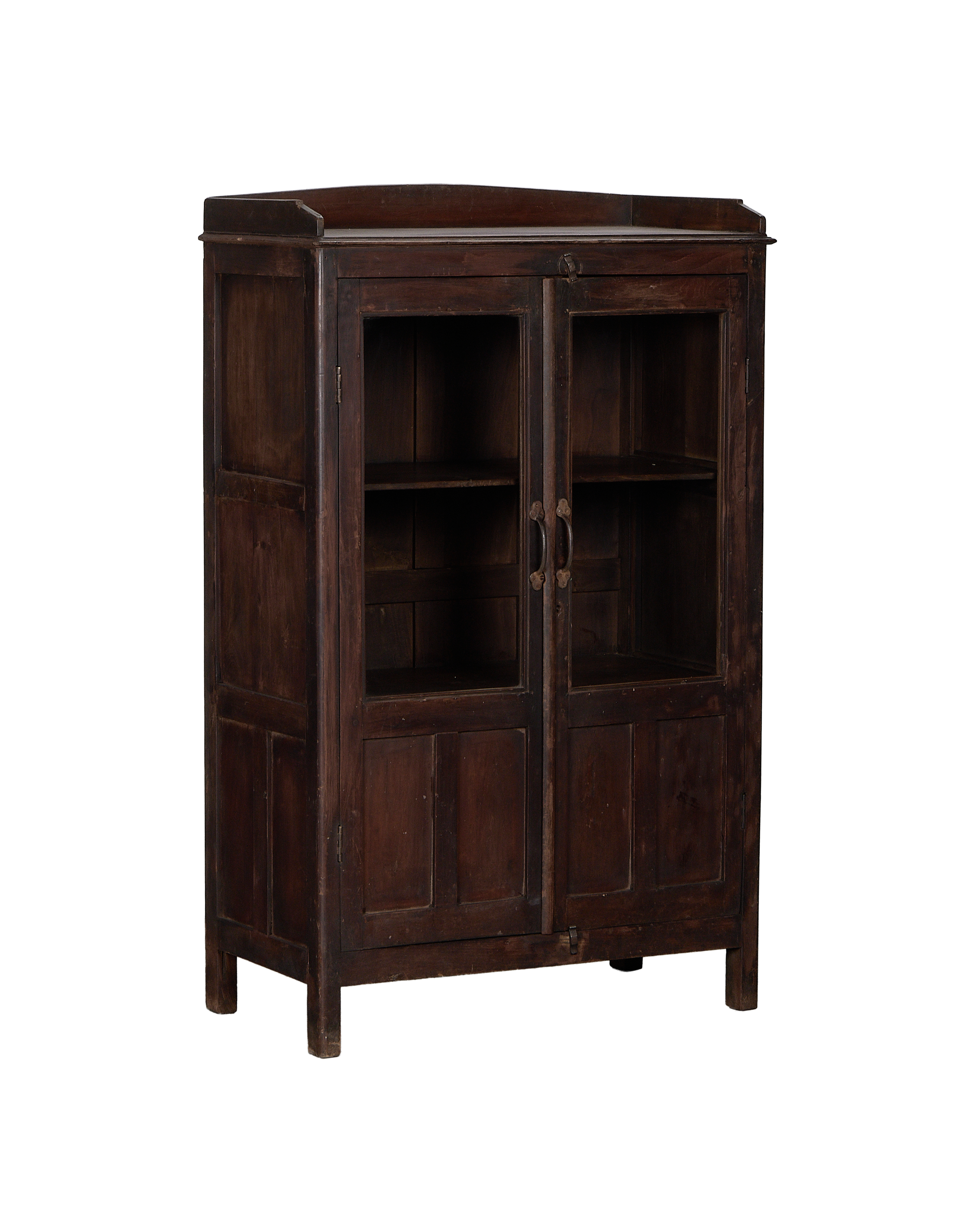 Vintage Indian oak cabinet from India, displaying visible wooden texture and glass-paneled doors.