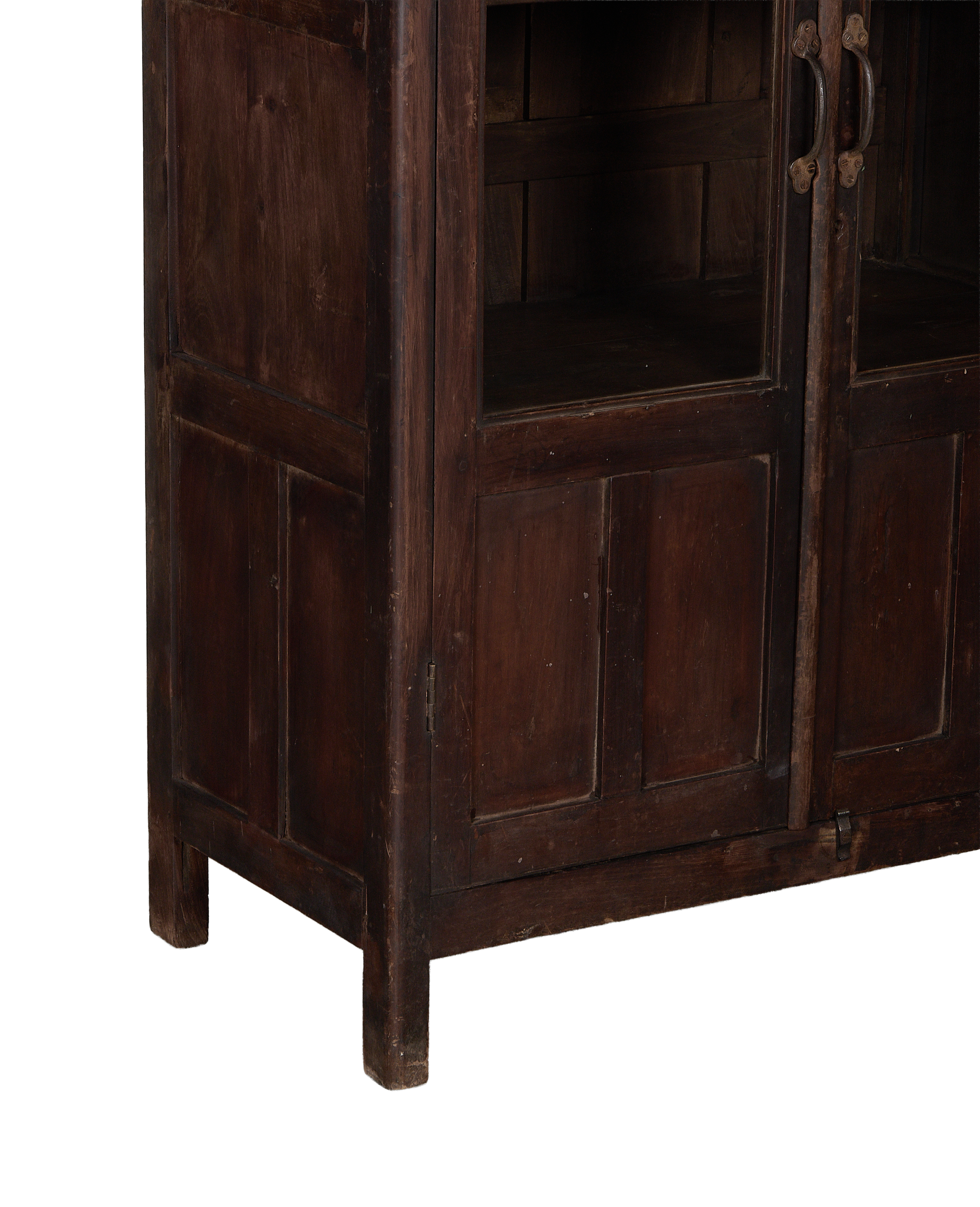 Vintage Indian oak cabinet bottom section, showing distressed wood, feet, and glass doors.