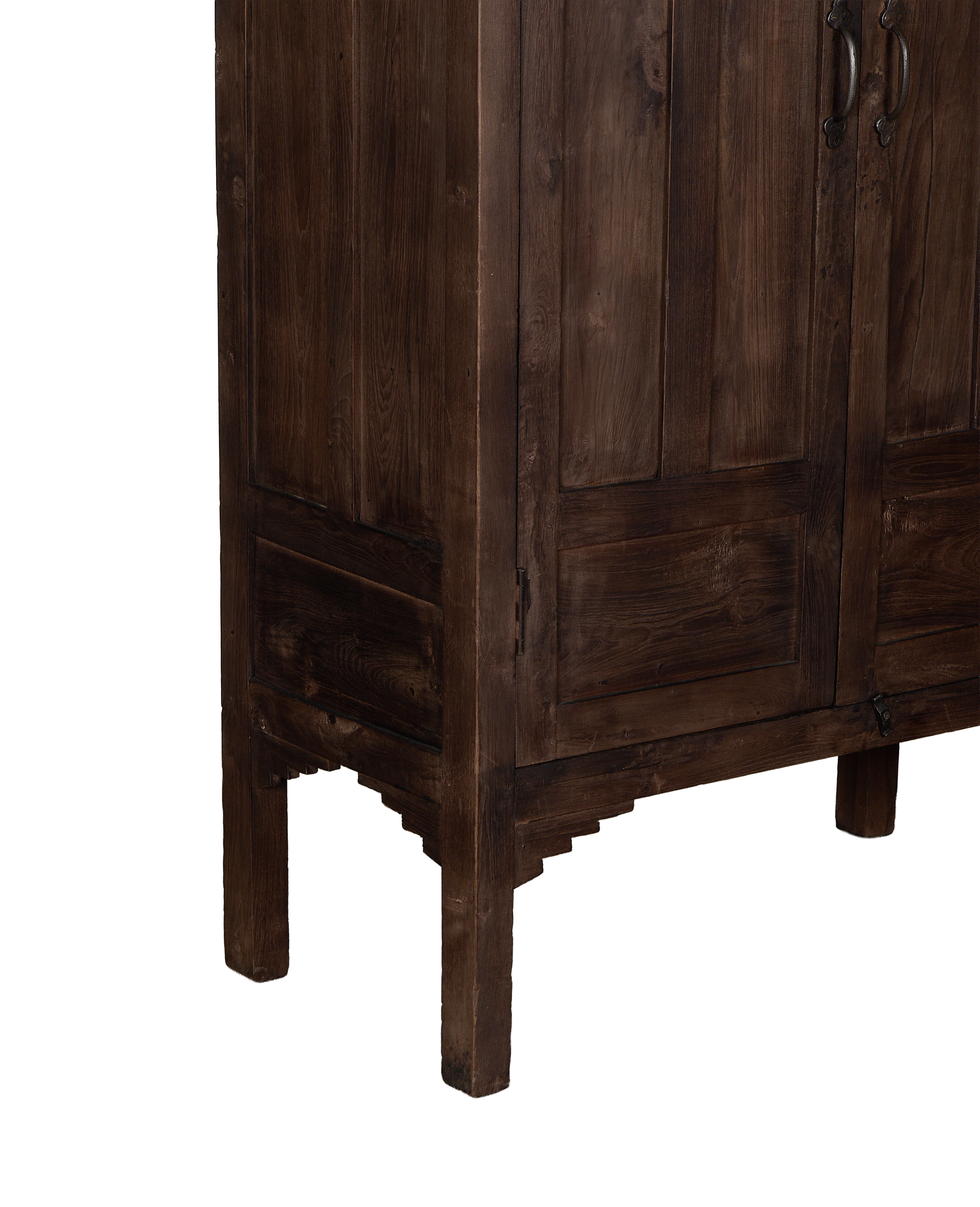 Vintage solid oak cabinet, showing intricate Indian craftsmanship around its base.