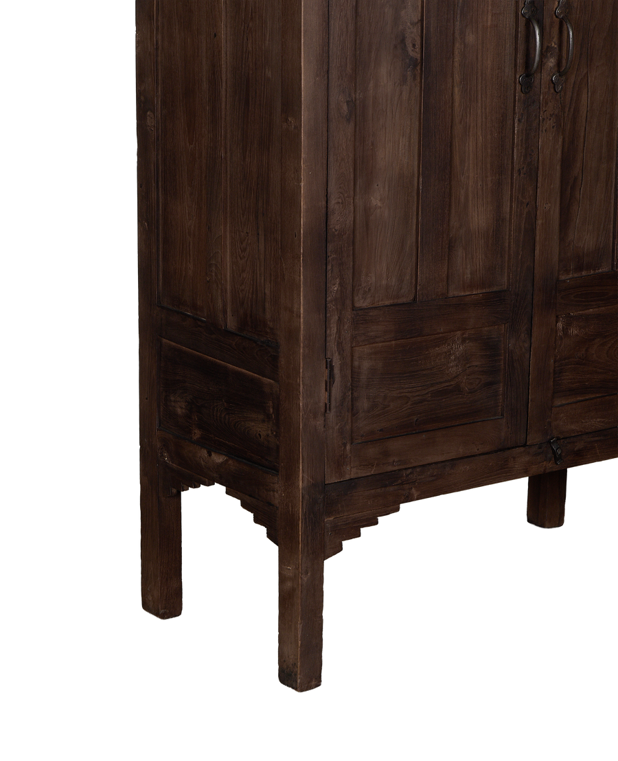 Vintage solid oak cabinet, showing intricate Indian craftsmanship around its base.