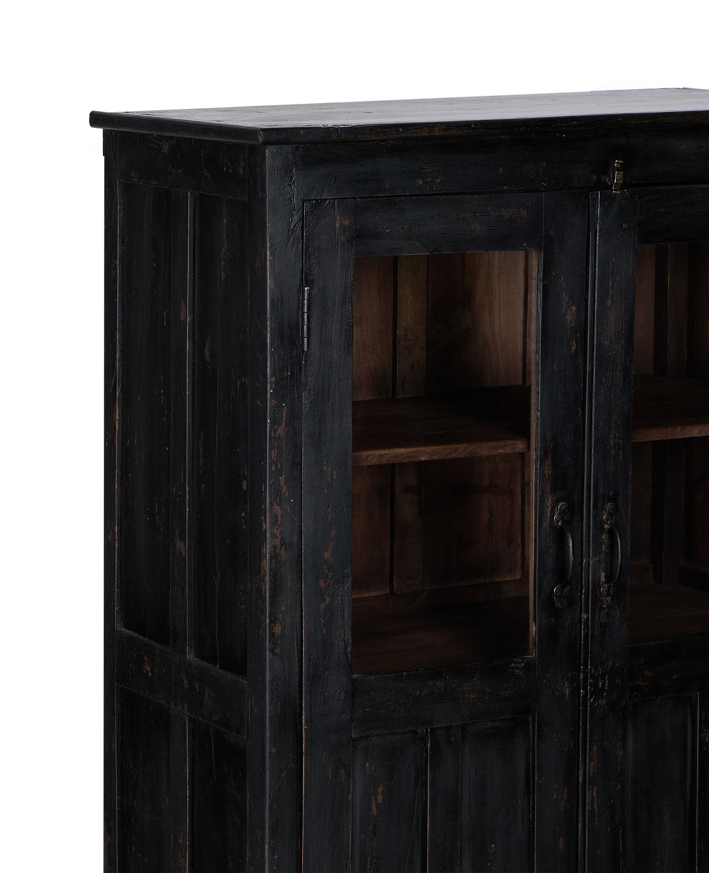 Close-up left side of vintage black stained oak cabinet showcasing glass doors and handles.