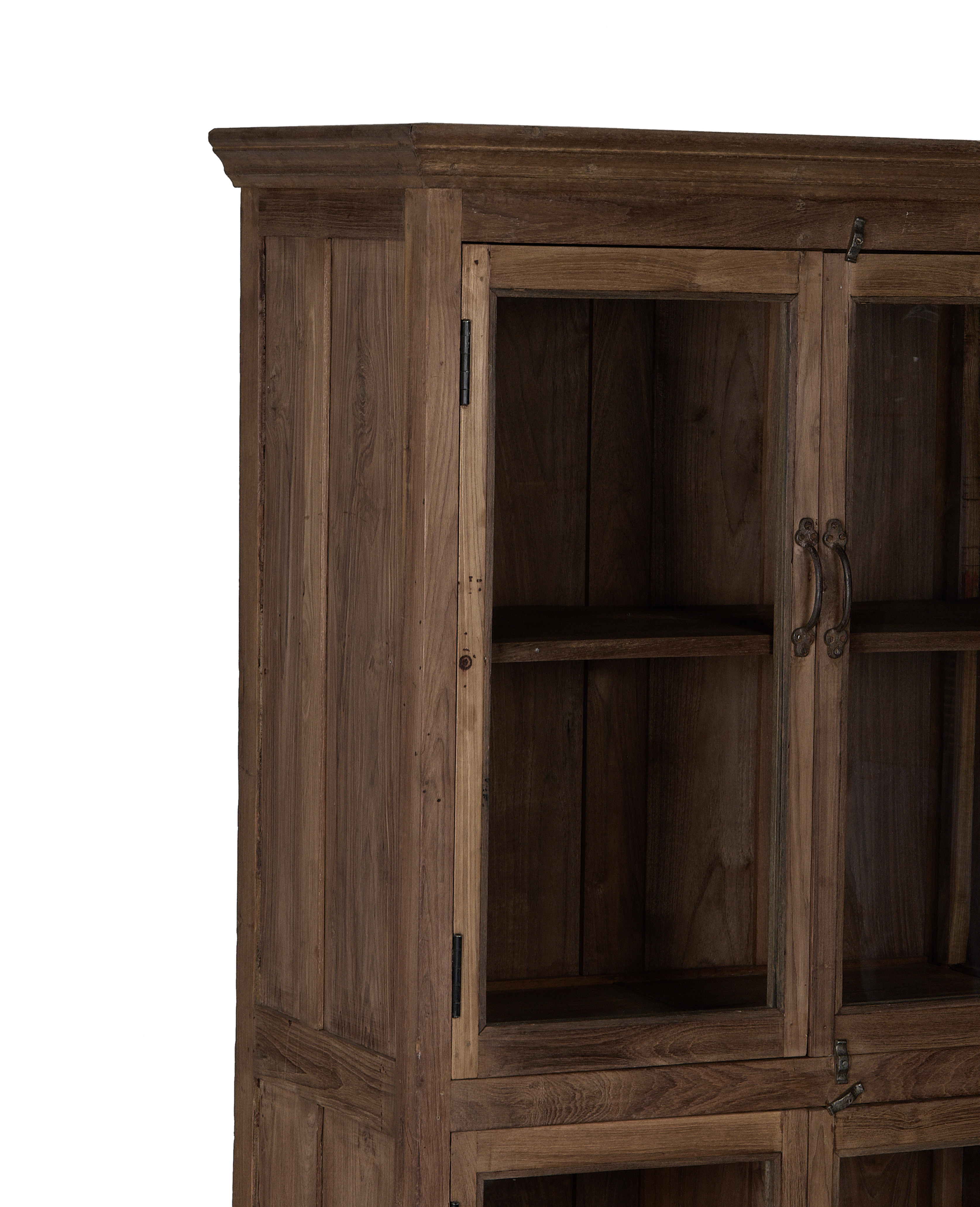 Vintage Indian oak wood cabinet, close-up of natural grain, glass doors, and aged hardware.