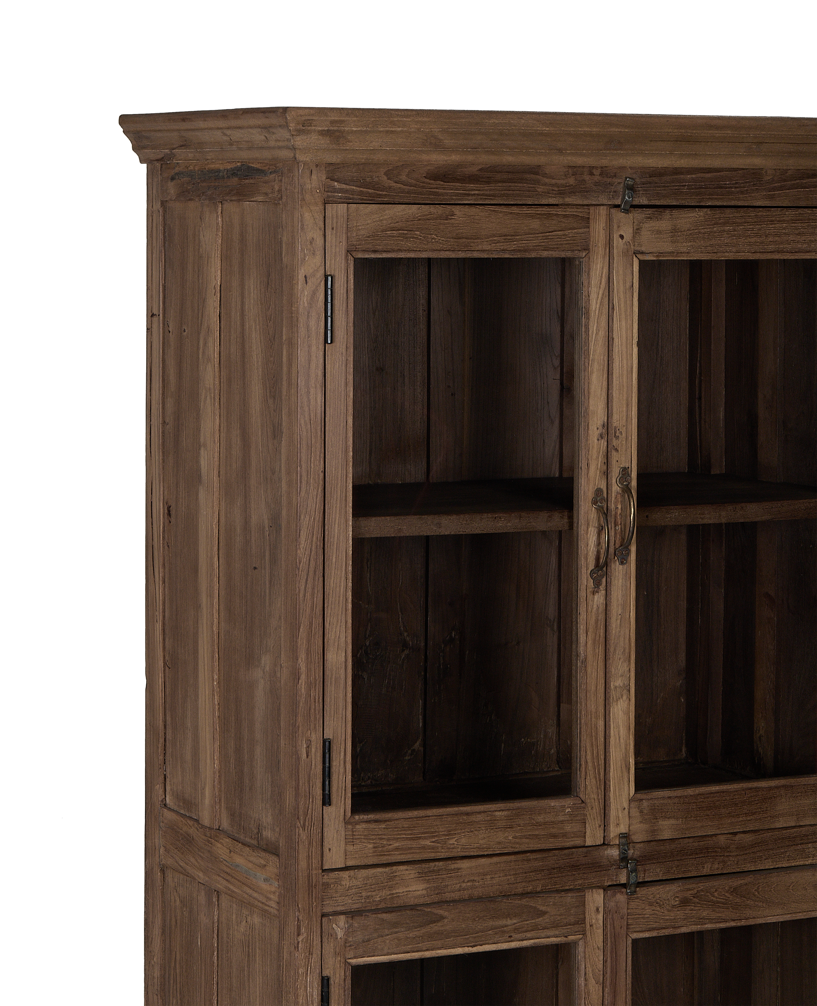 Vintage Indian oak wood cabinet, close-up of glass doors, antique brass hardware.