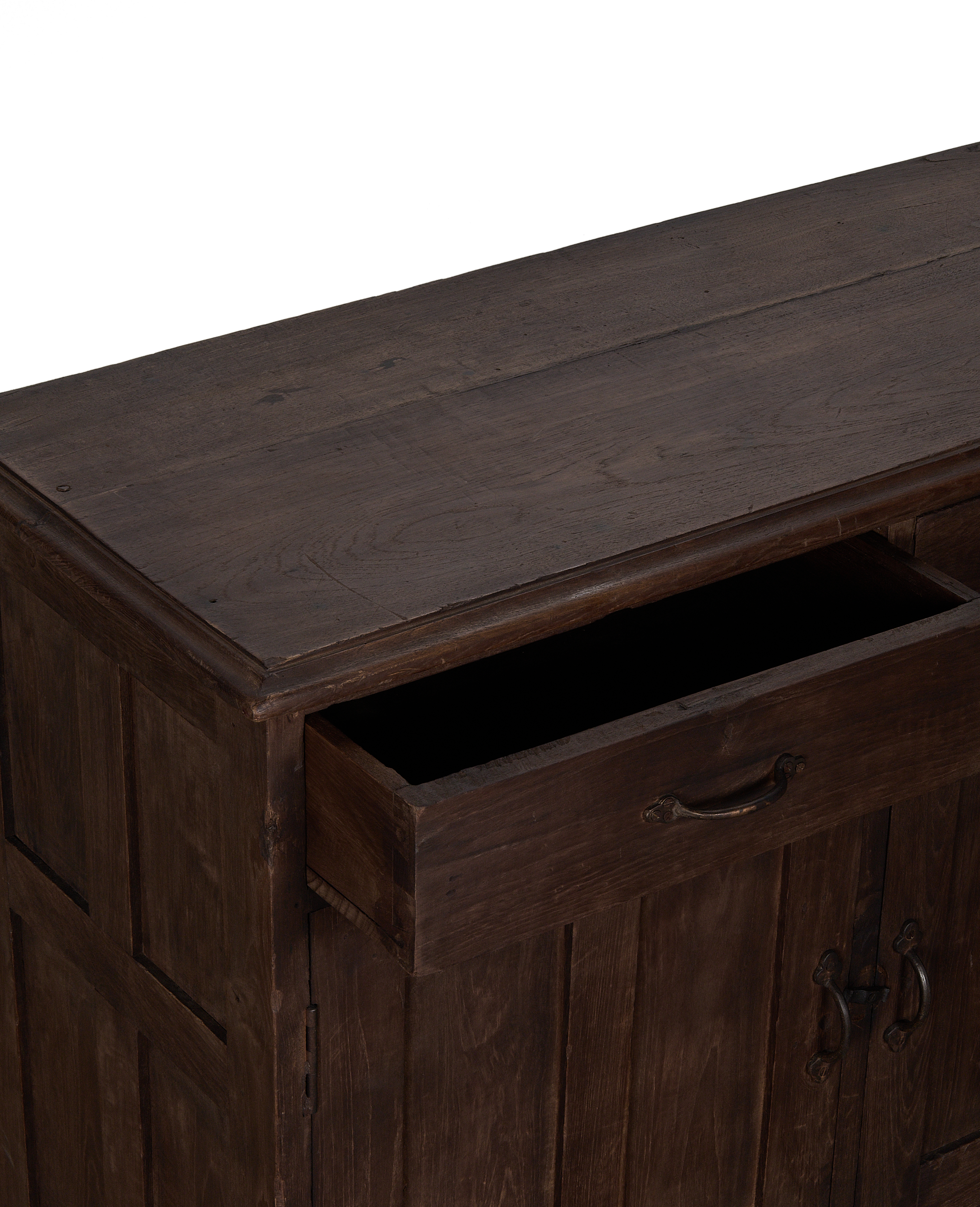 Vintage oak sideboard, open top drawer with dark interior storage, natural wood.