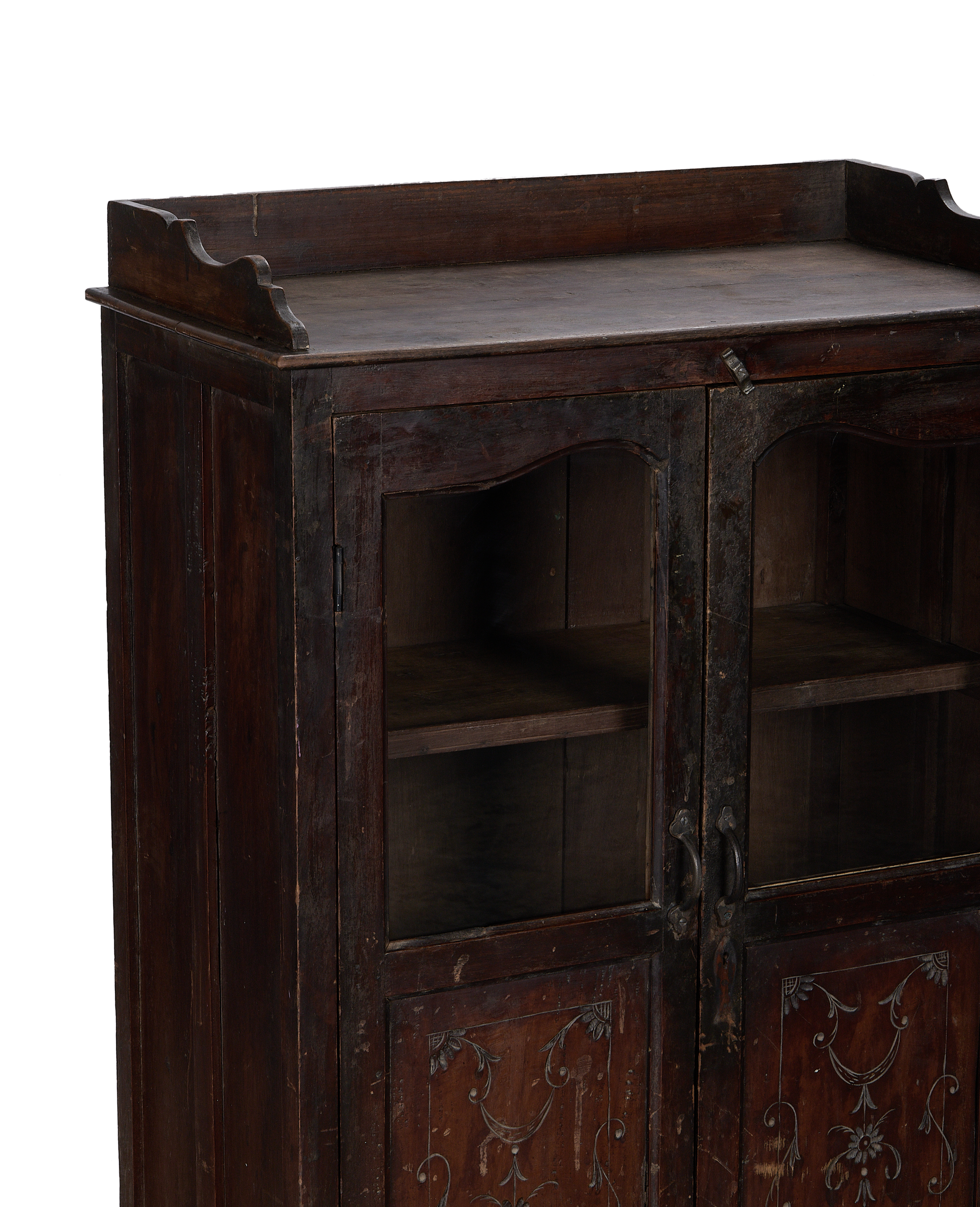 Vintage Indian oak wood cabinet, close-up top right showing ornate glass doors.