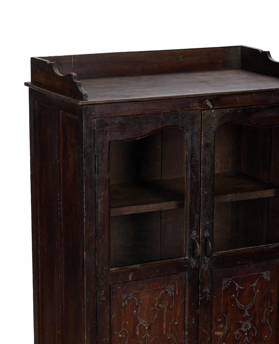 Vintage Indian oak wood cabinet, close-up top right showing ornate glass doors.