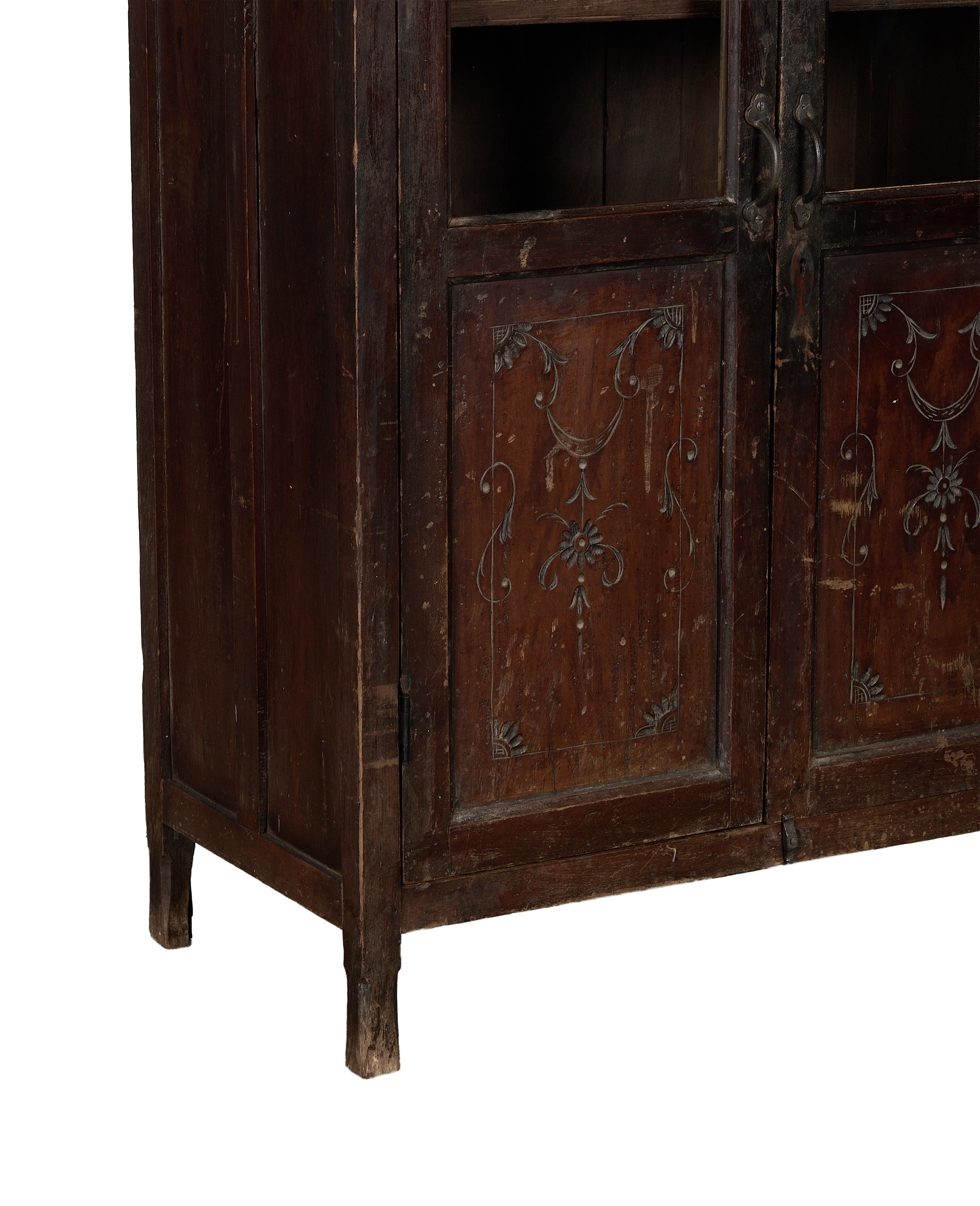 Vintage Indian oak wood cabinet, close-up of decorative carved door panels on bottom right.