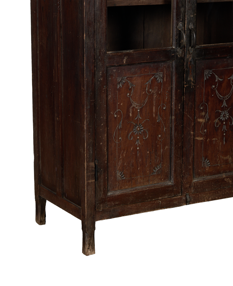 Vintage Indian oak wood cabinet, close-up of decorative carved door panels on bottom right.